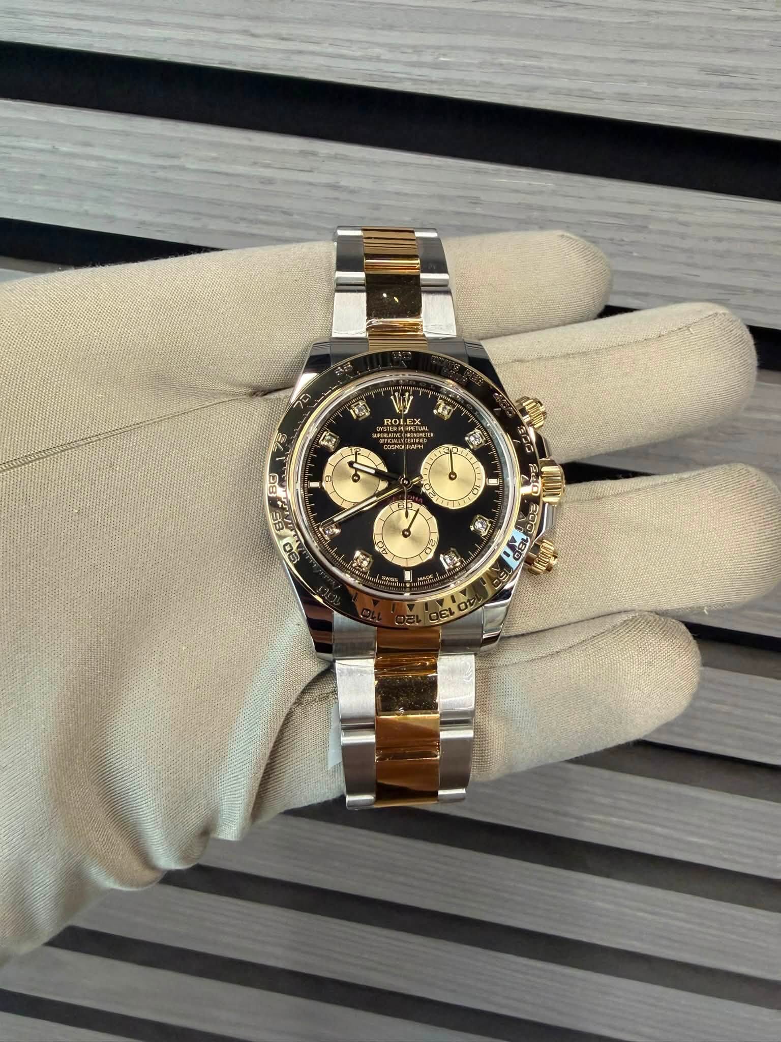 May be an image of wrist watch and text