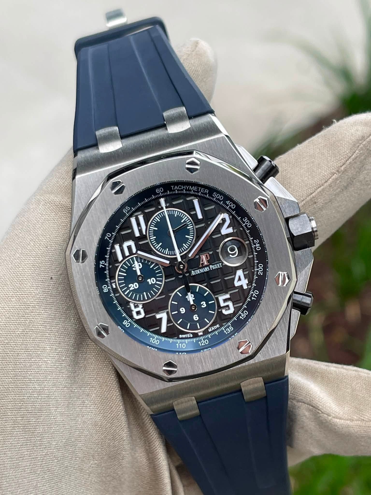 May be an image of wrist watch and text