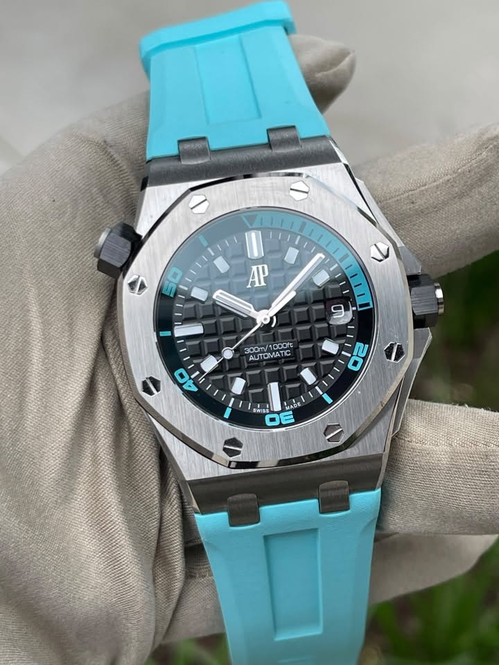 May be an image of wrist watch and text that says '50 AP O 300m/ 300m/1000t 300m oooft AU AUTOMATIO MATI a 40 20 ก MADE 155 DE'