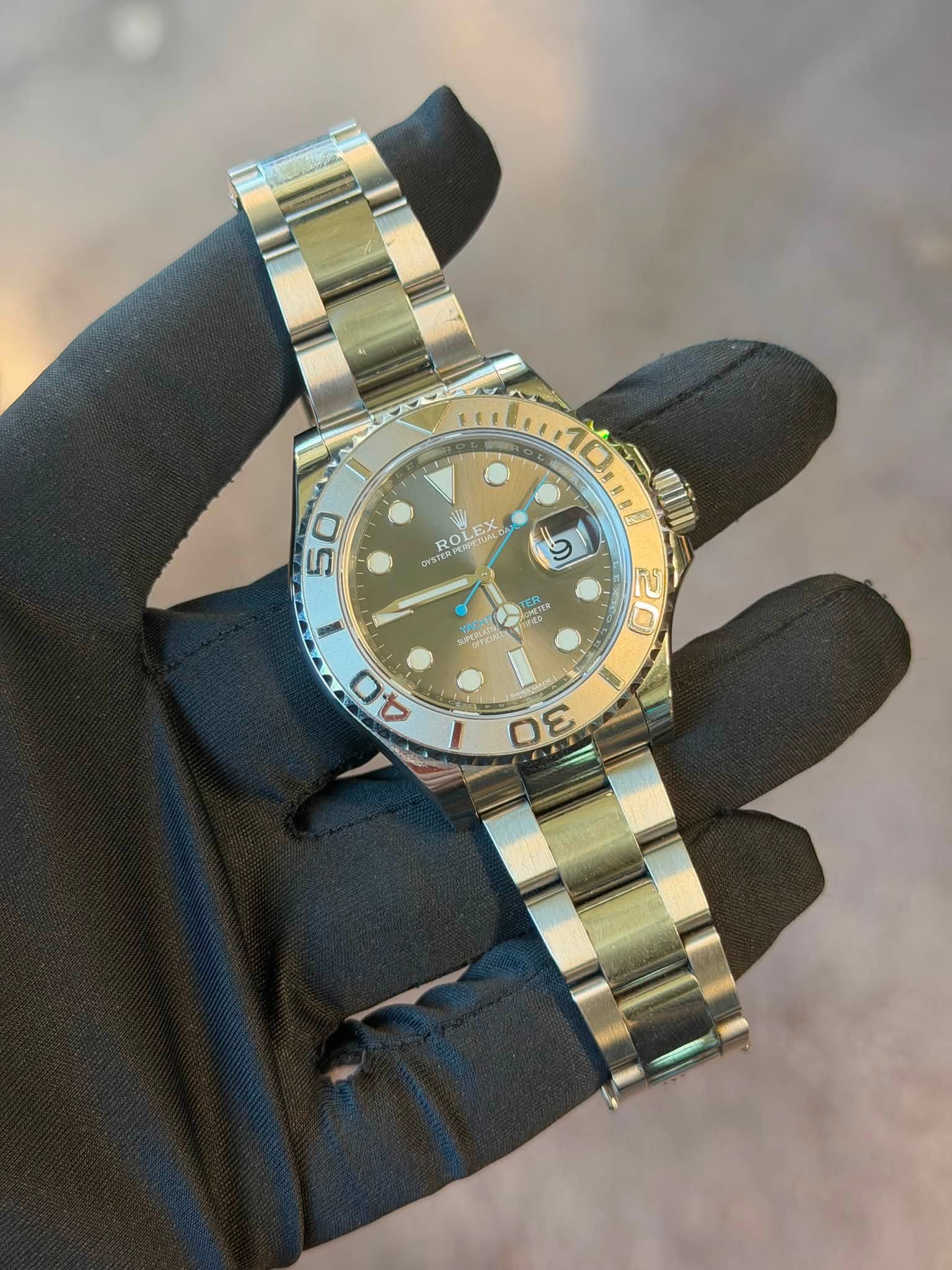 May be an image of wrist watch and text