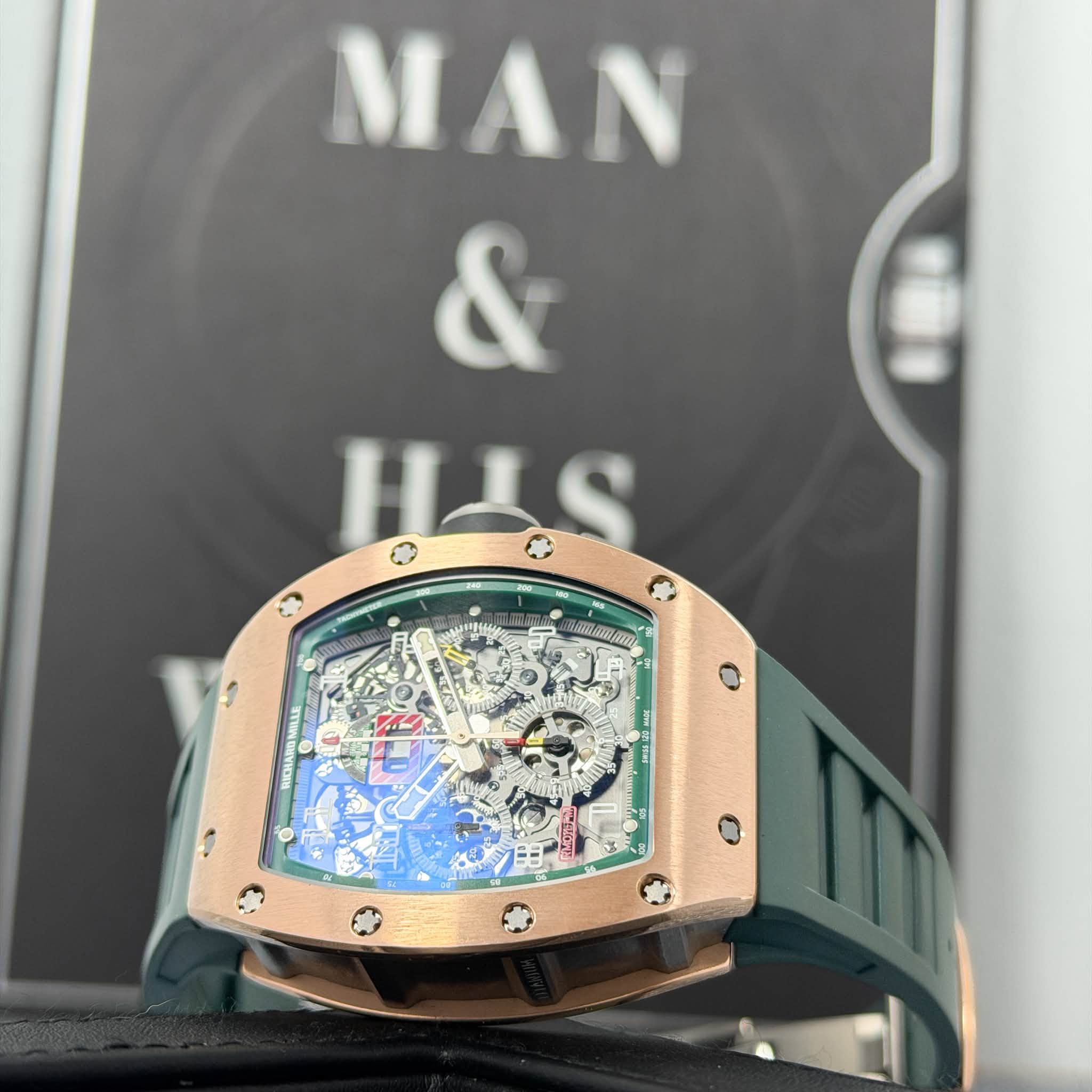May be an image of wrist watch and text