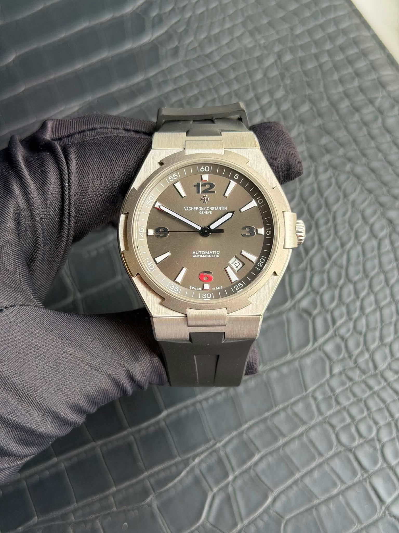 May be an image of wrist watch and text