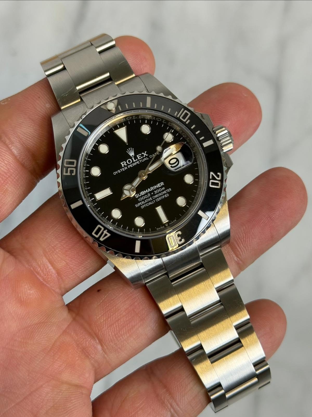 May be an image of wrist watch and text that says 'I 10 ROLEX ROL ROLEX RPERPETUAL ا EX RO OYS 50 9 SUBMARINER NDOMN 300m RTEcK INER 300m INER 0m 1000/t 1000 PERLATIVE 20 te 40…