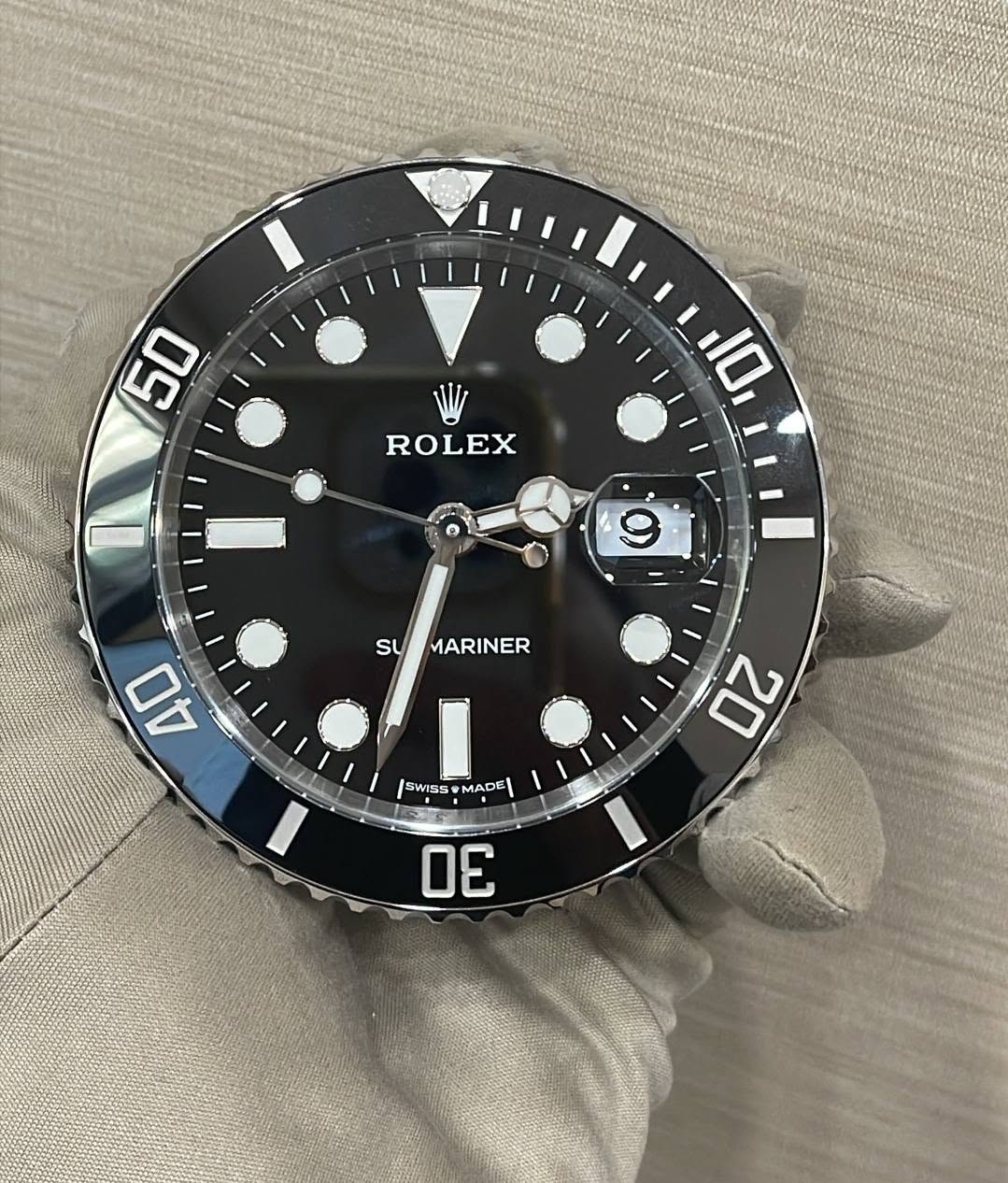 May be an image of wrist watch and text that says '50 ROLEX 10 9 SU MARINER 40 I IsWs SWISS SWSSMADE MAD 30 20'