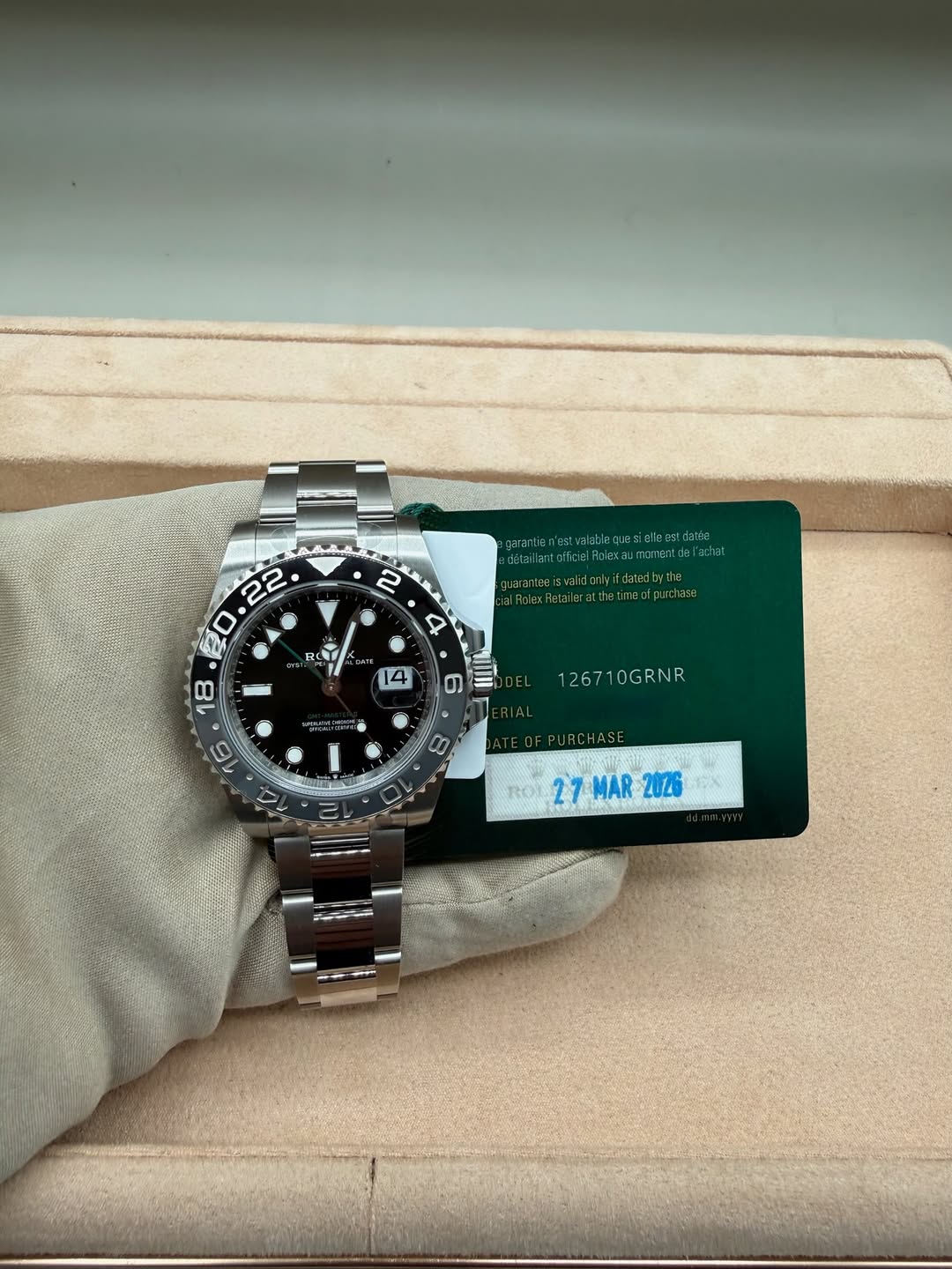 May be an image of wrist watch and text