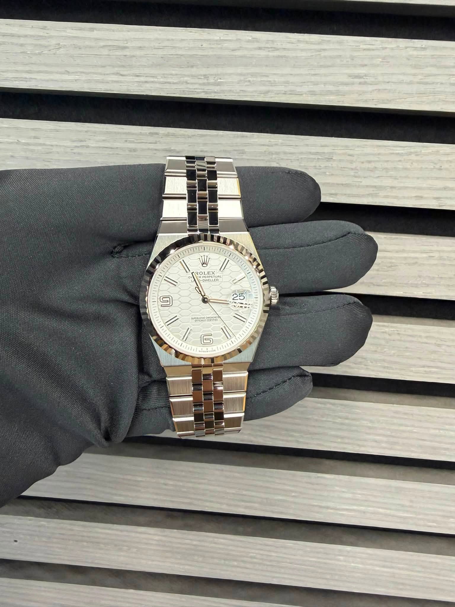 May be an image of wrist watch