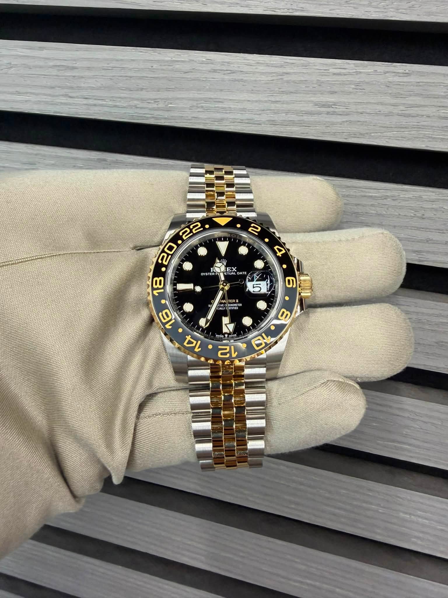 May be an image of wrist watch and text