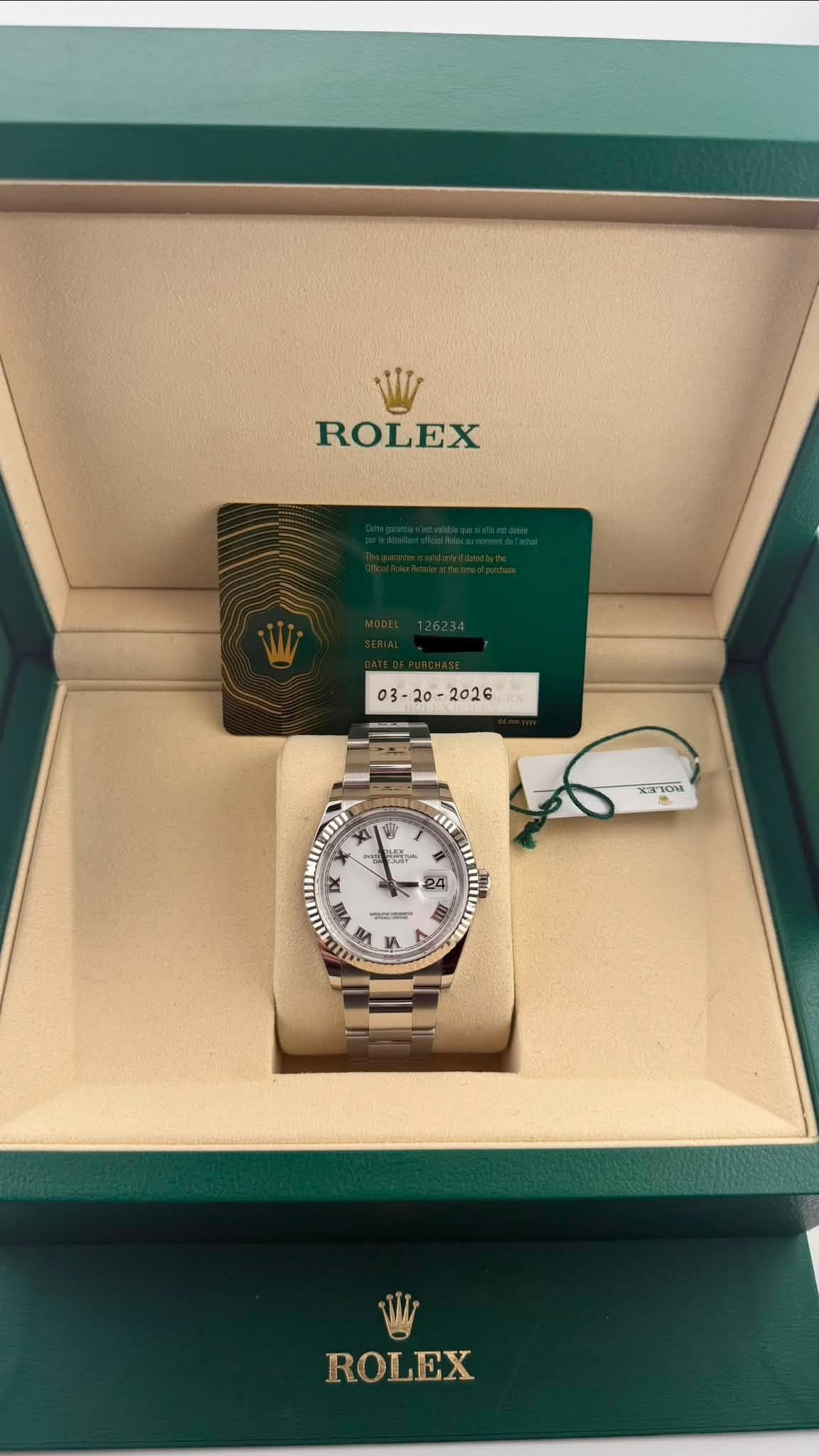 May be an image of wrist watch and text that says 'ROLEX መባ xaHom Ν 然 4一 택 ារ T + 4 24 多 M I ROLEX'