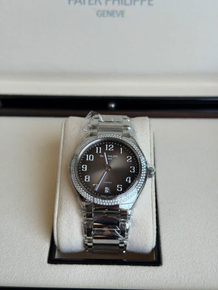 May be an image of wrist watch and text