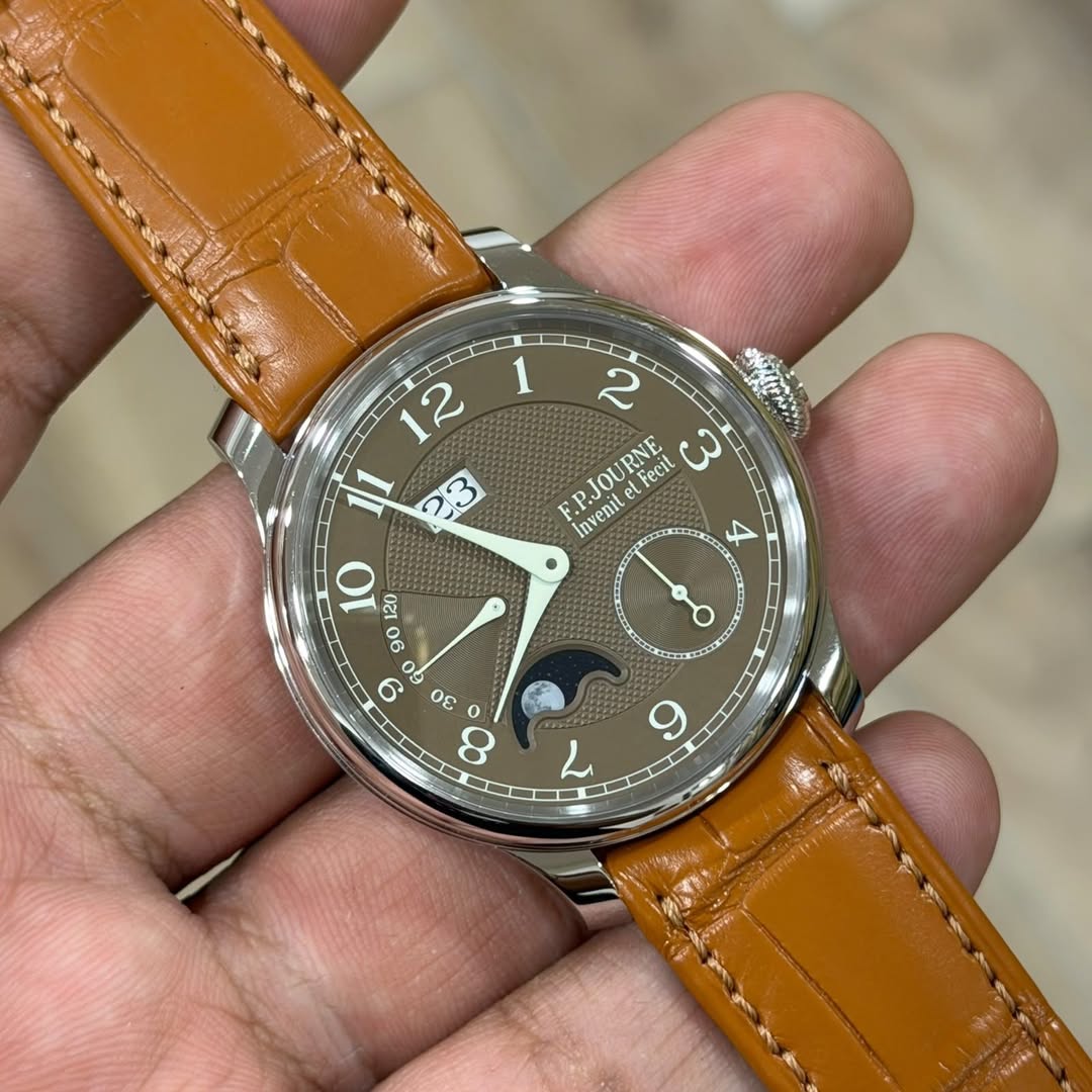 May be an image of wrist watch and text that says '12 1 2 F.P.JOURNE Fecit Fecit ၂ Invenil X DI 1e0 90 O 6 0 οε 8 9 O ر'