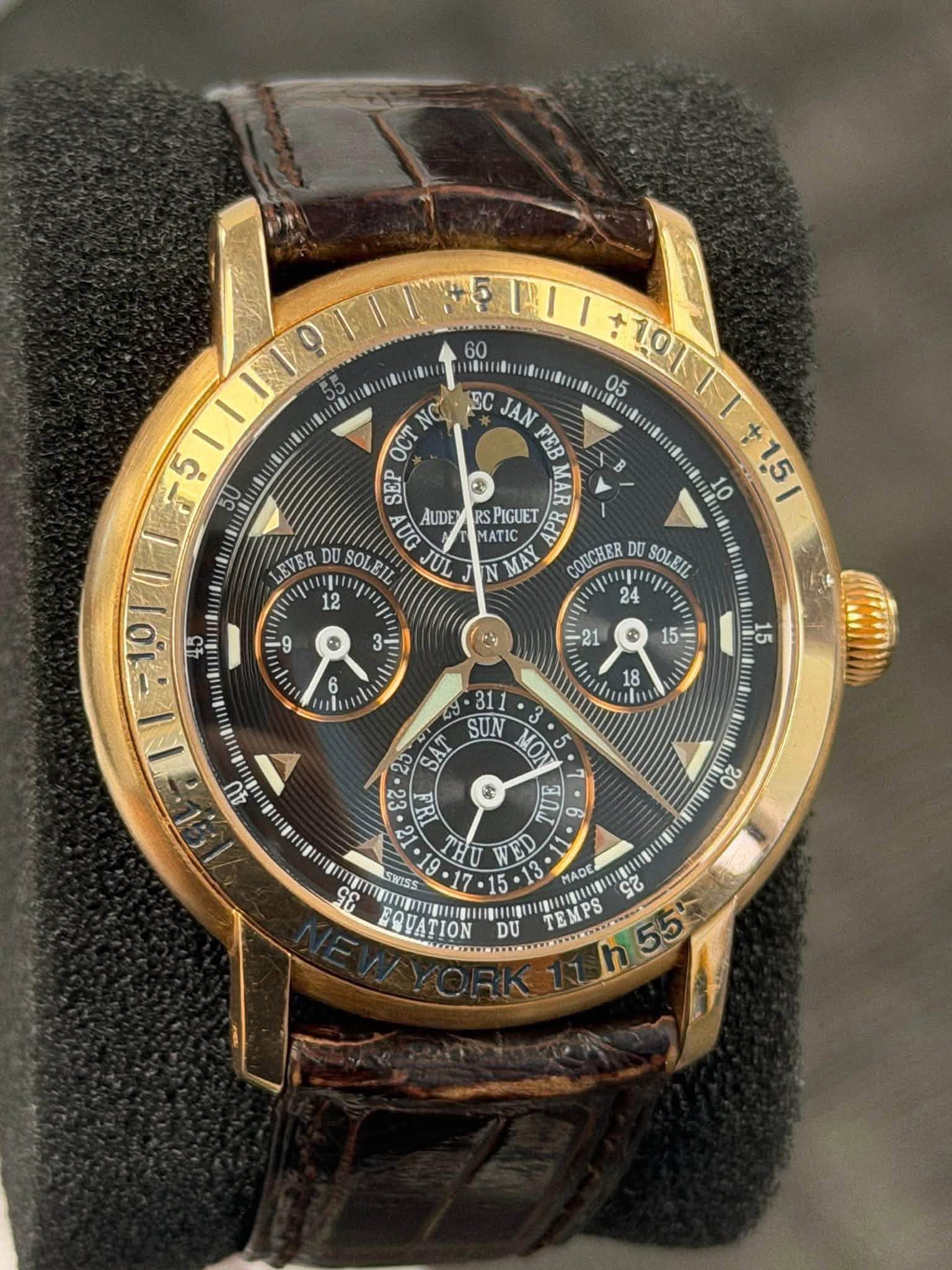 May be an image of wrist watch and text