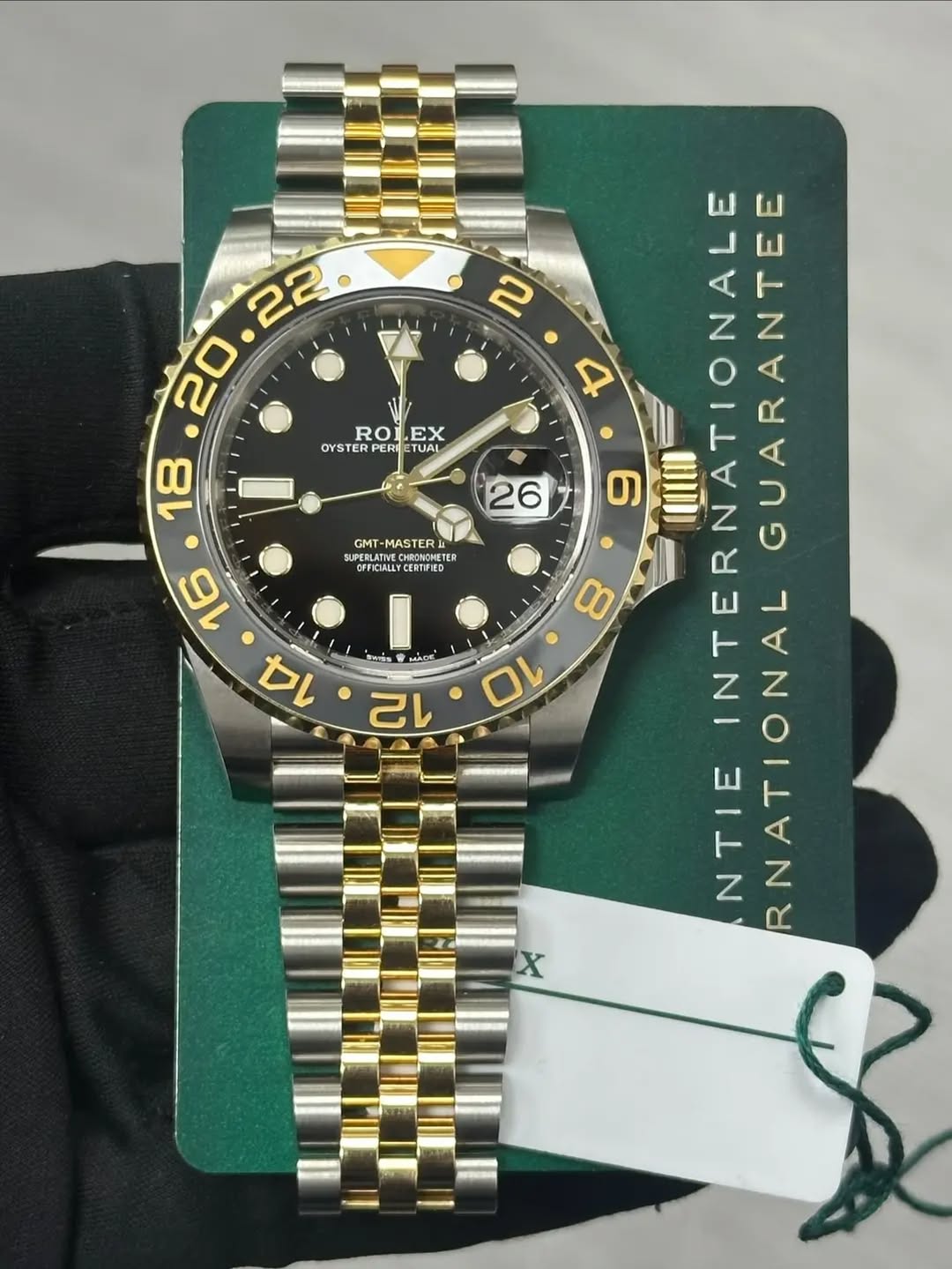May be an image of wrist watch and text that says '22 20 ROI ROLEX EX OYSTER PER TUAL 18 26 6 GMT- MASTER SUPEBLATTVE.CHROMONETCR OFFICALY ENEE 16 14 ام โเื 12 a 2 4 I…