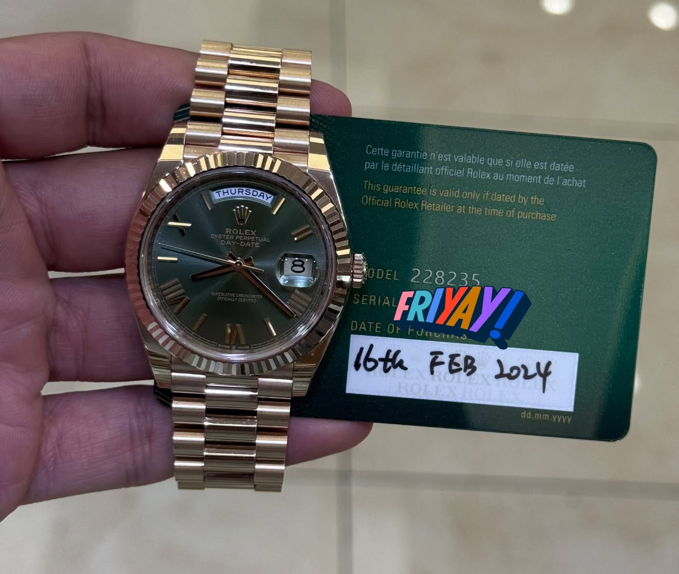 May be an image of wrist watch and text