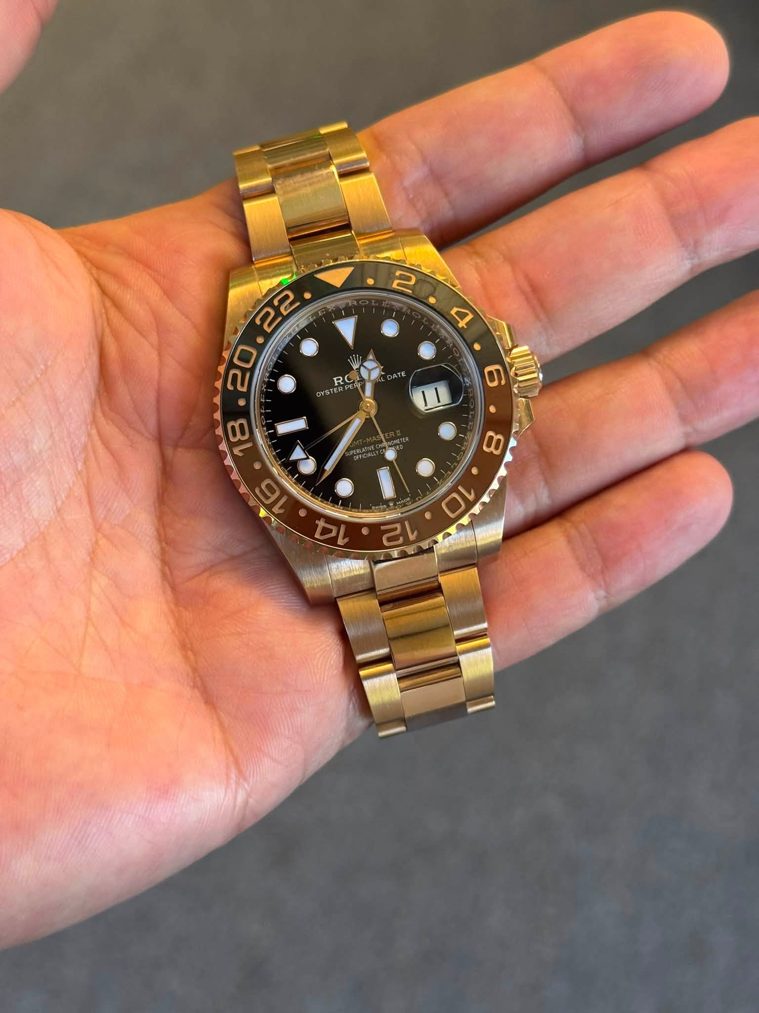 May be an image of wrist watch and text