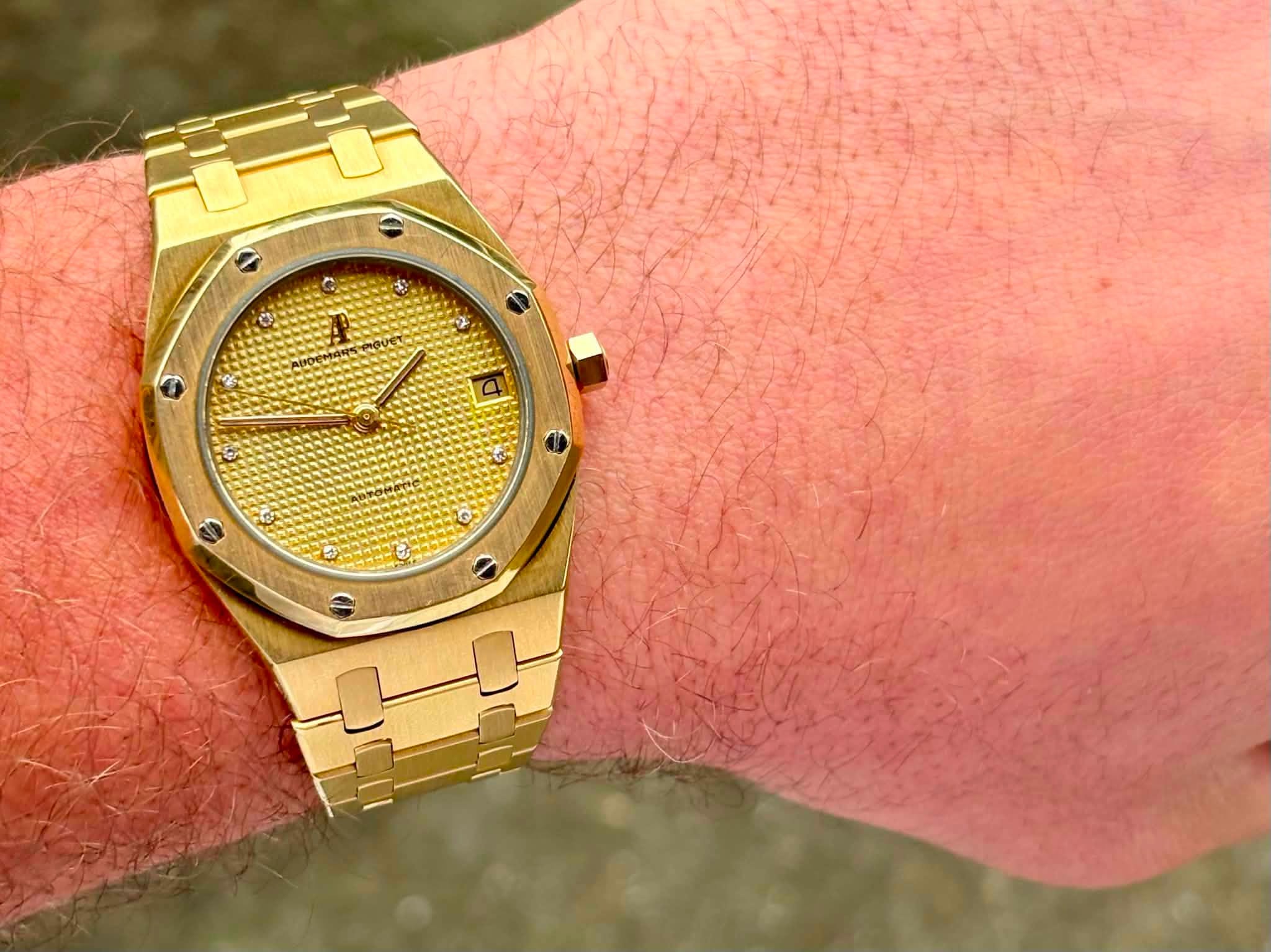 May be an image of digital watch and text