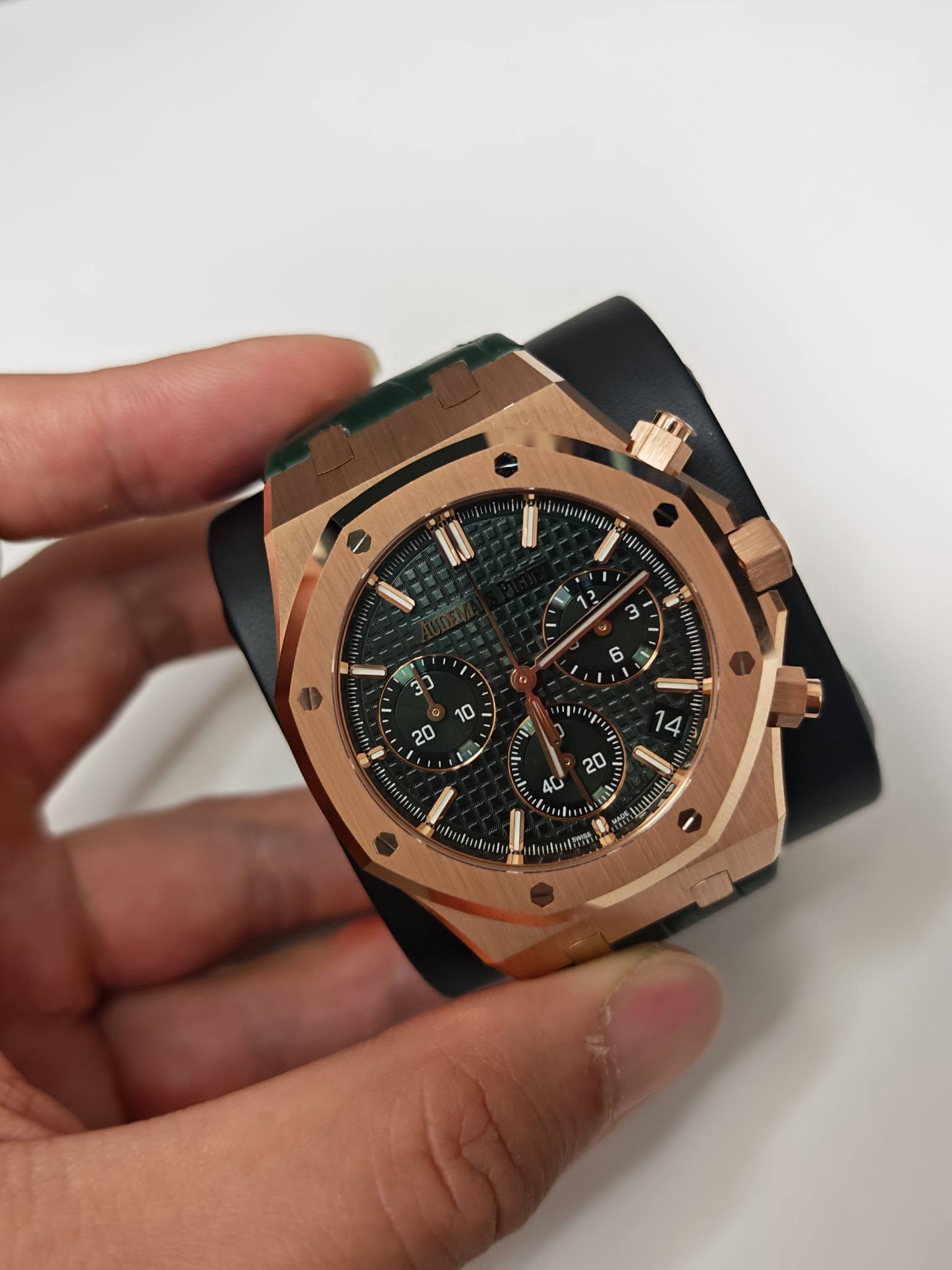 May be an image of wrist watch and text