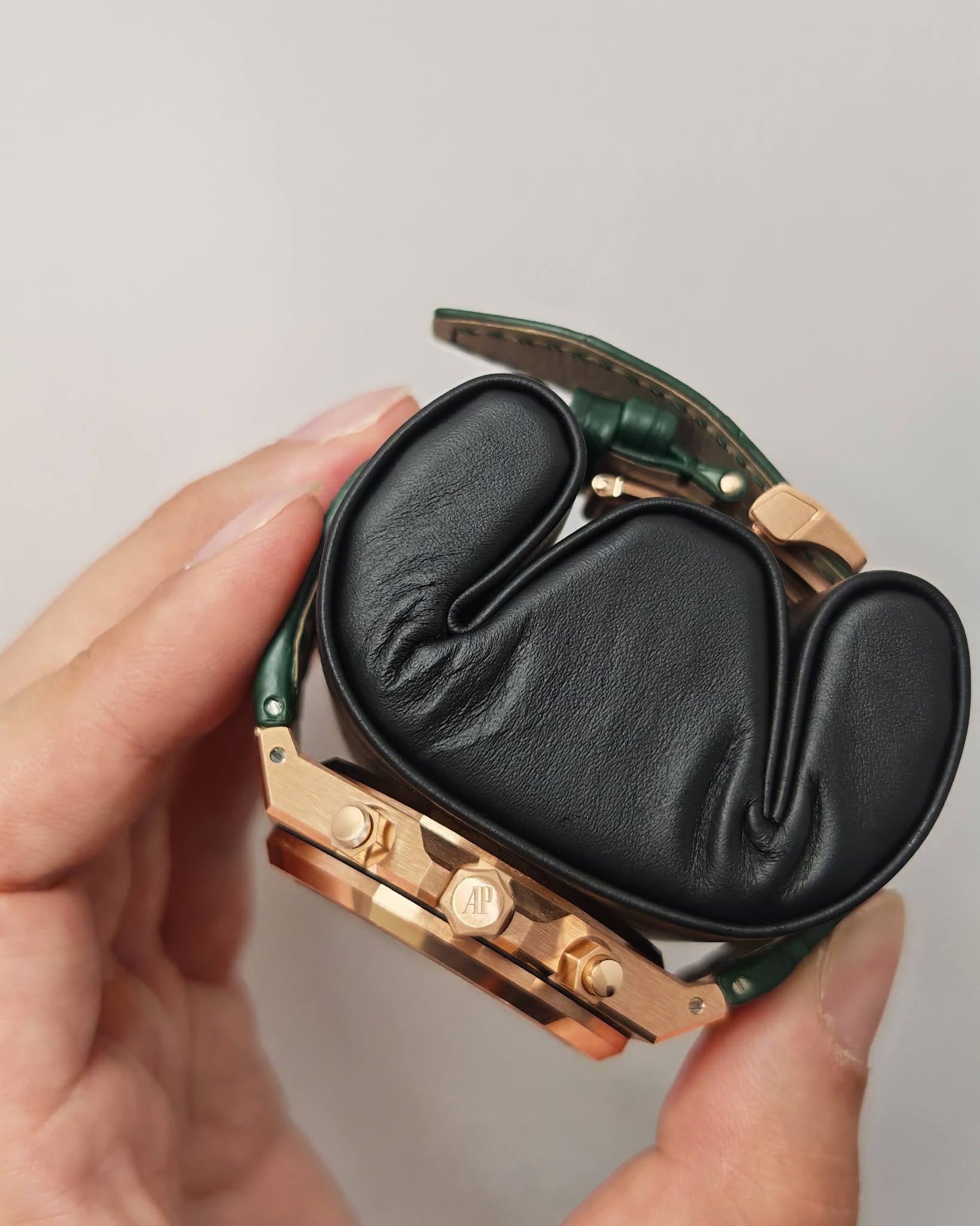 May be an image of wrist watch and leather