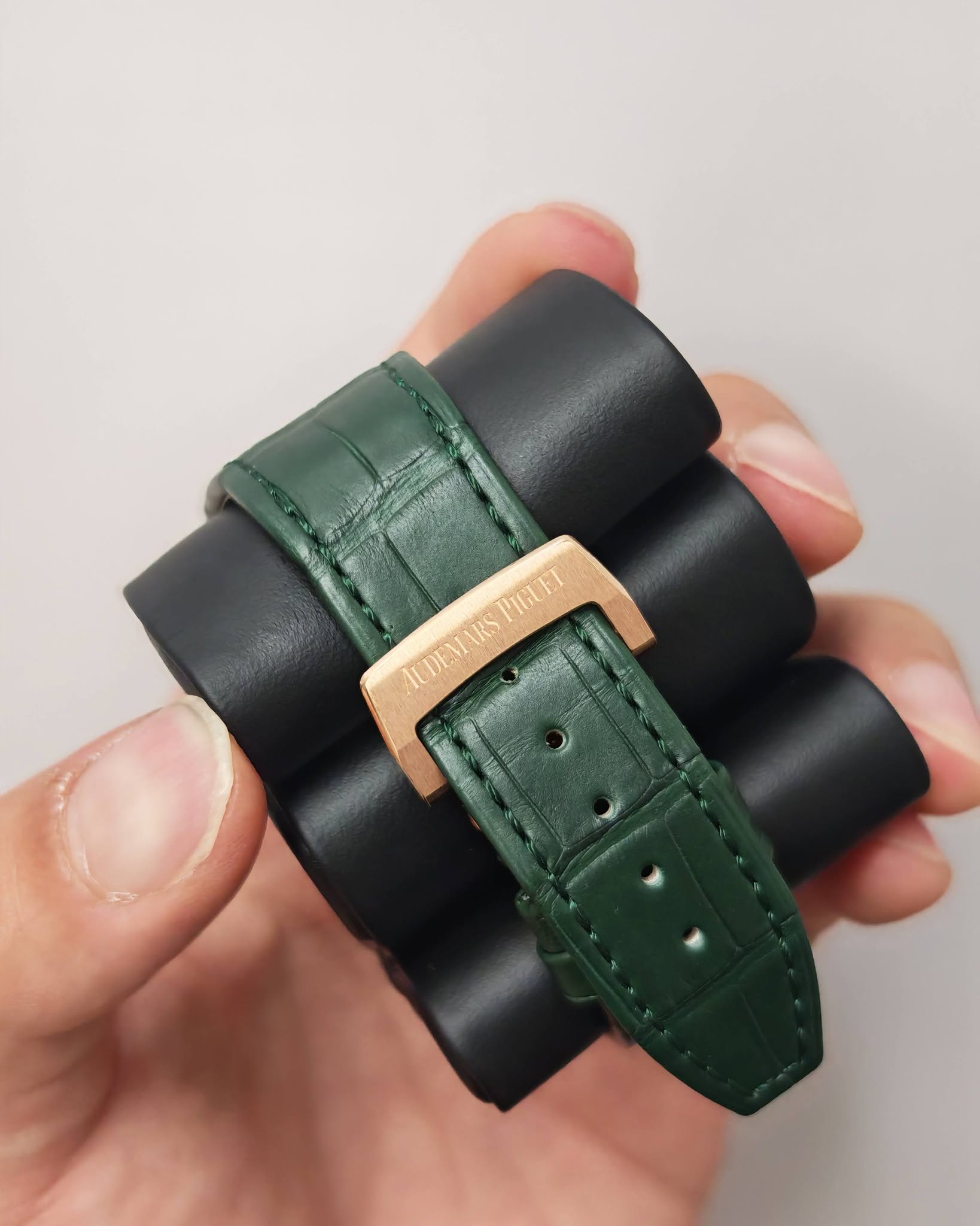 May be an image of saddle-stitched leather, wrist watch and leather