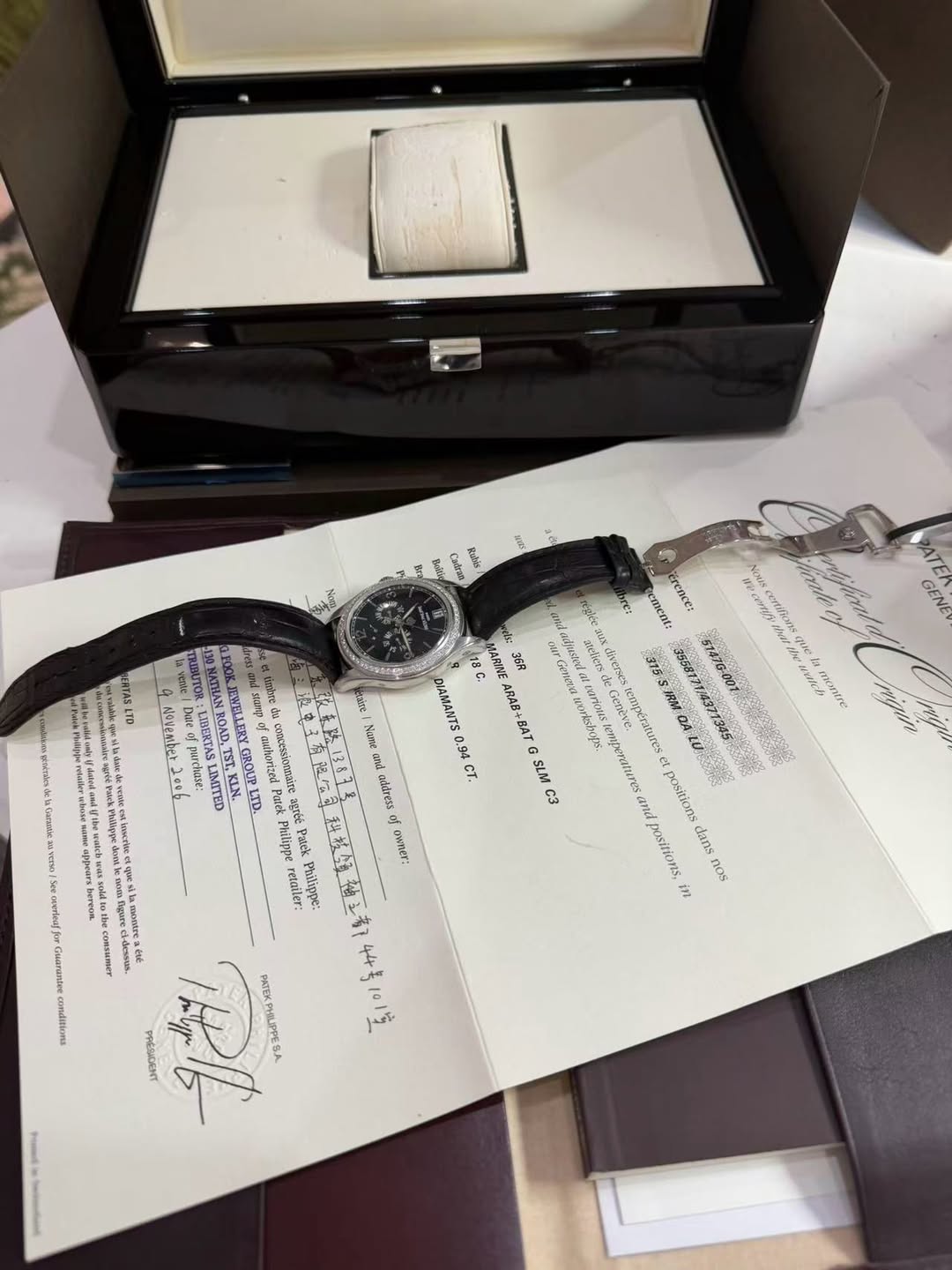 May be an image of wrist watch and text
