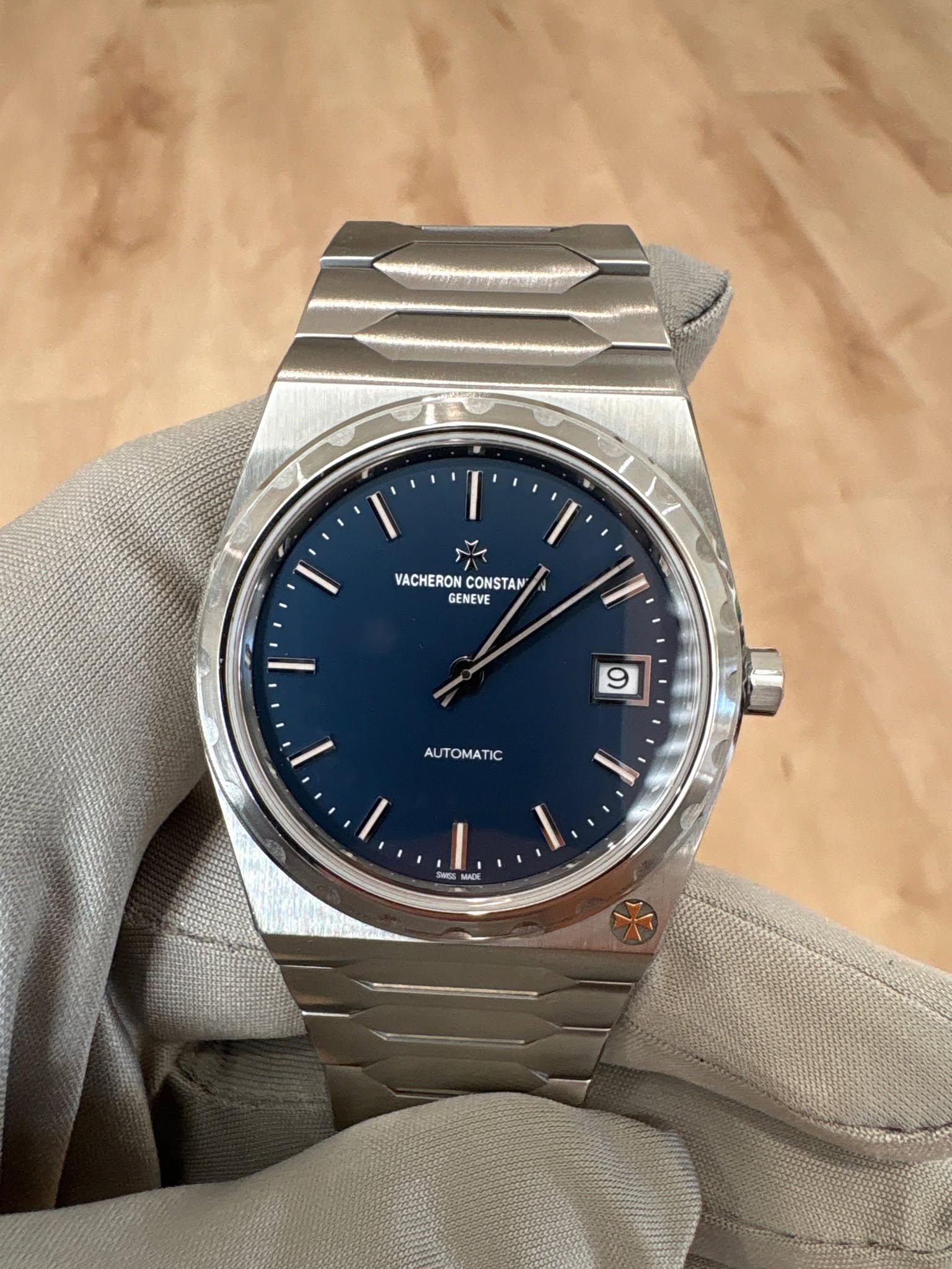 May be an image of wrist watch and text