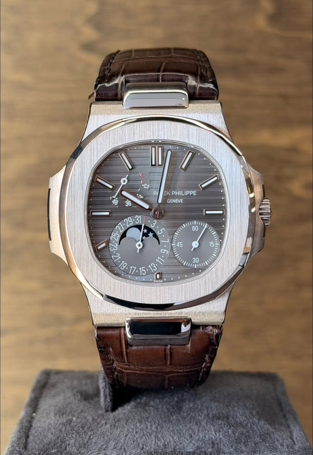 May be an image of wrist watch and text