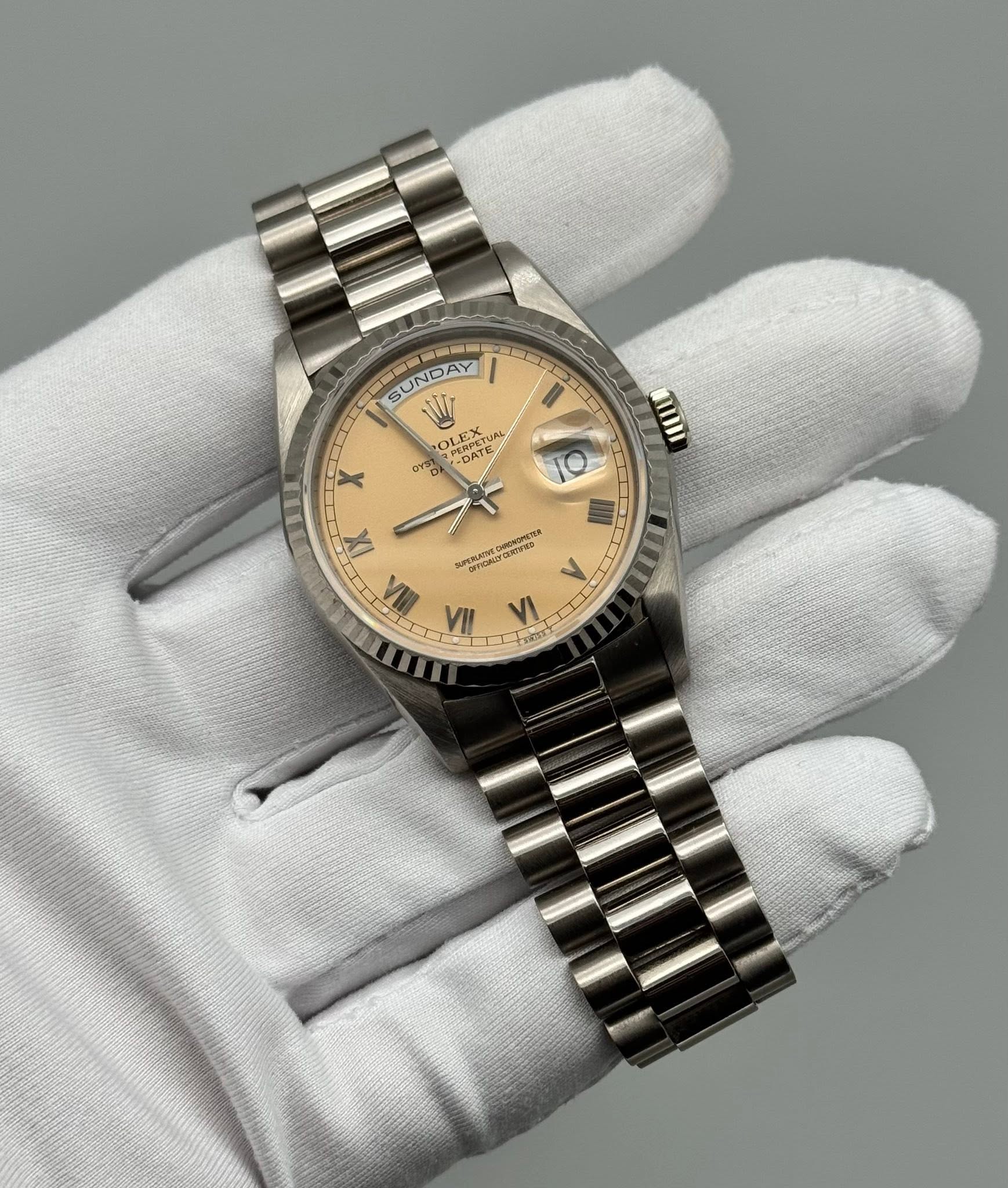 May be an image of wrist watch and text