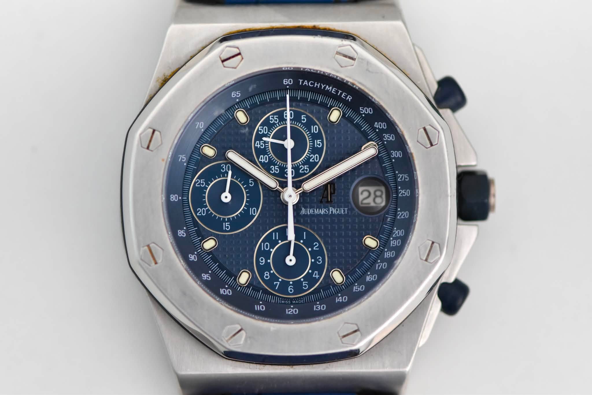May be an image of wrist watch and text that says '65 70 60 TACHYMETE nyaepepлpиoHa ER nppaaap ARISSOUAILE L O AUDEMARSPIGLET PIGUET 28 II రి '