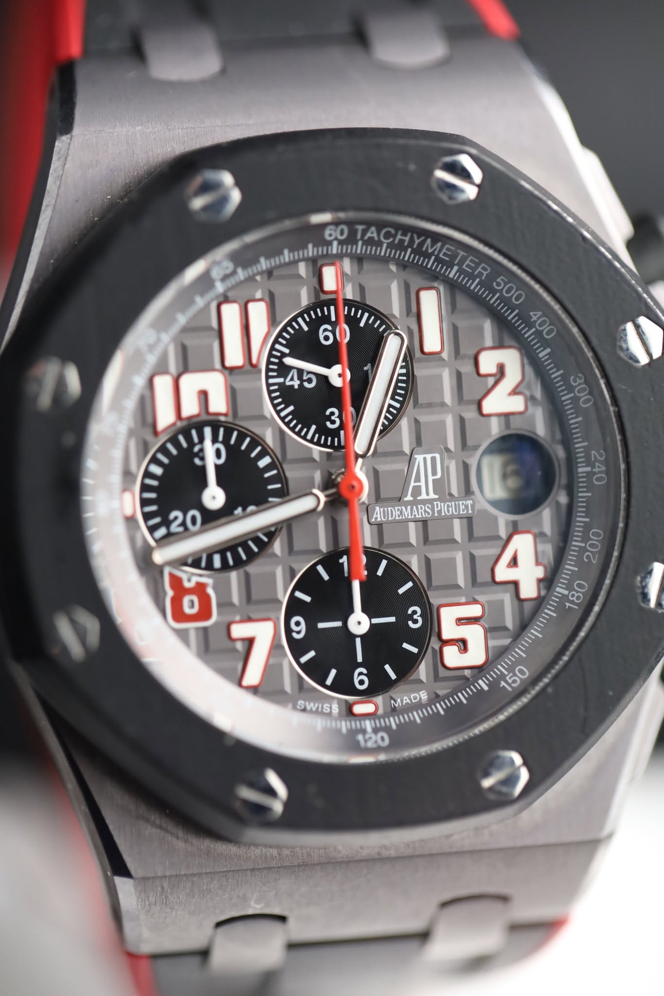 May be an image of wrist watch and text