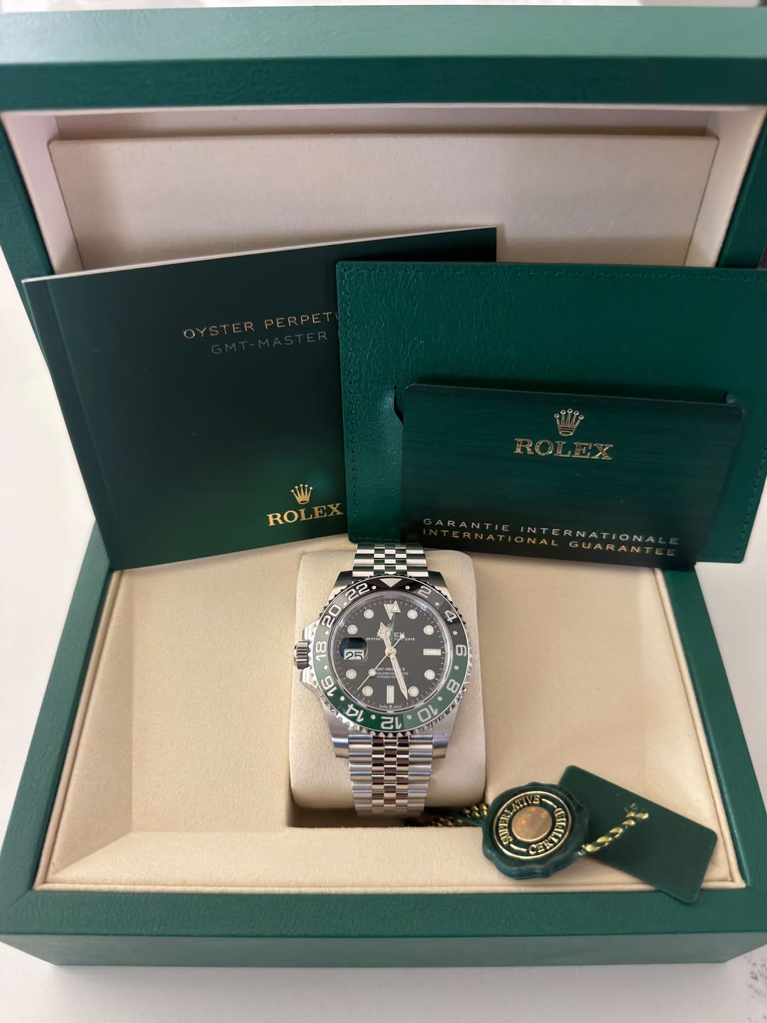 May be an image of wrist watch and text that says 'WA ROLEX RO INTERNATIONA GUARANT y Q - 2O 0 P5 16 산 6 6 20 CL ክ DF រា T T 2R1'