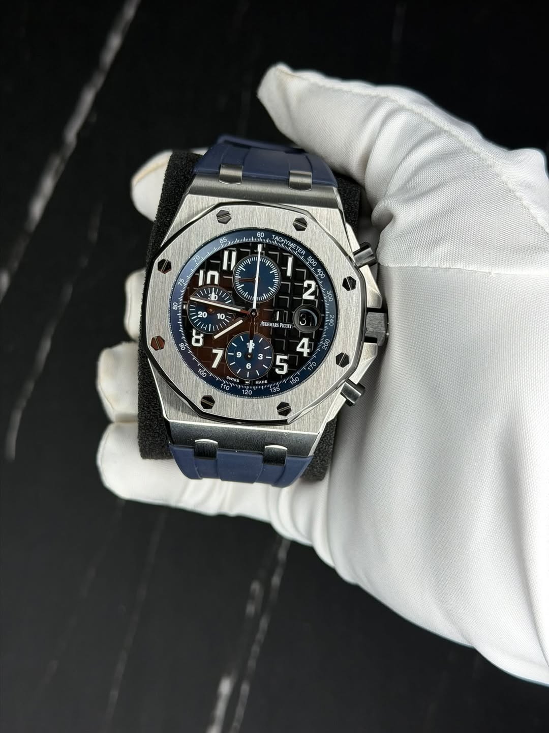 May be an image of wrist watch and text