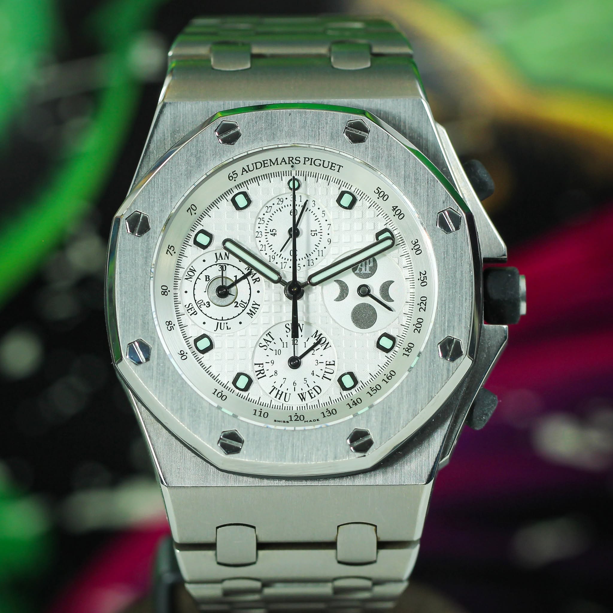 May be an image of wrist watch and text
