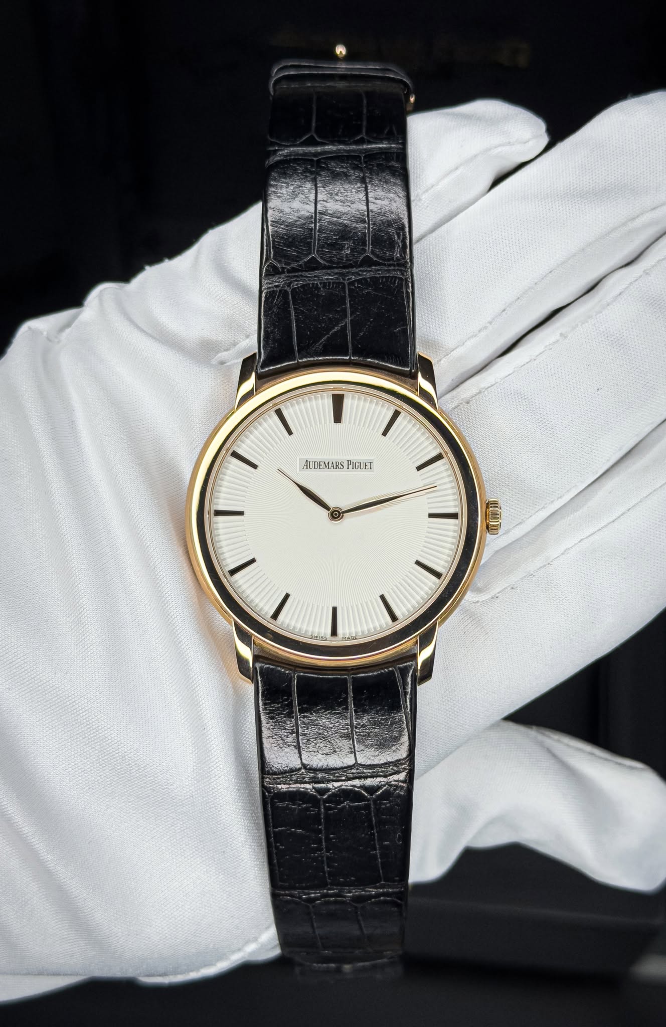 May be an image of wrist watch and text
