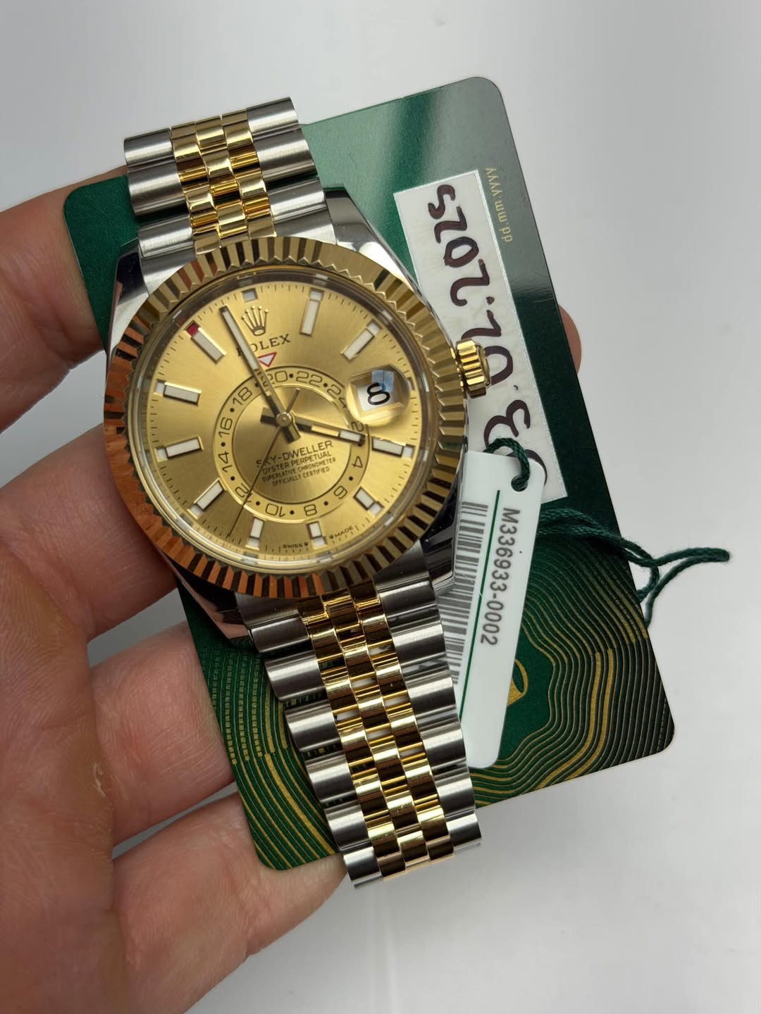 May be an image of wrist watch and text