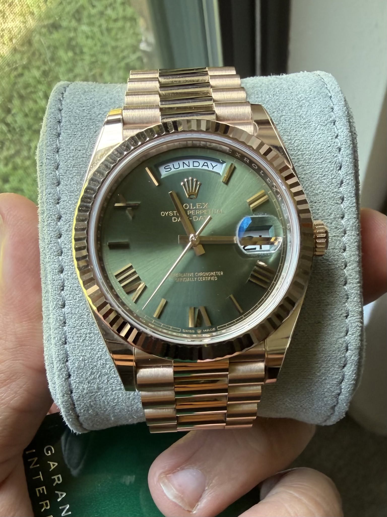 May be an image of wrist watch and text