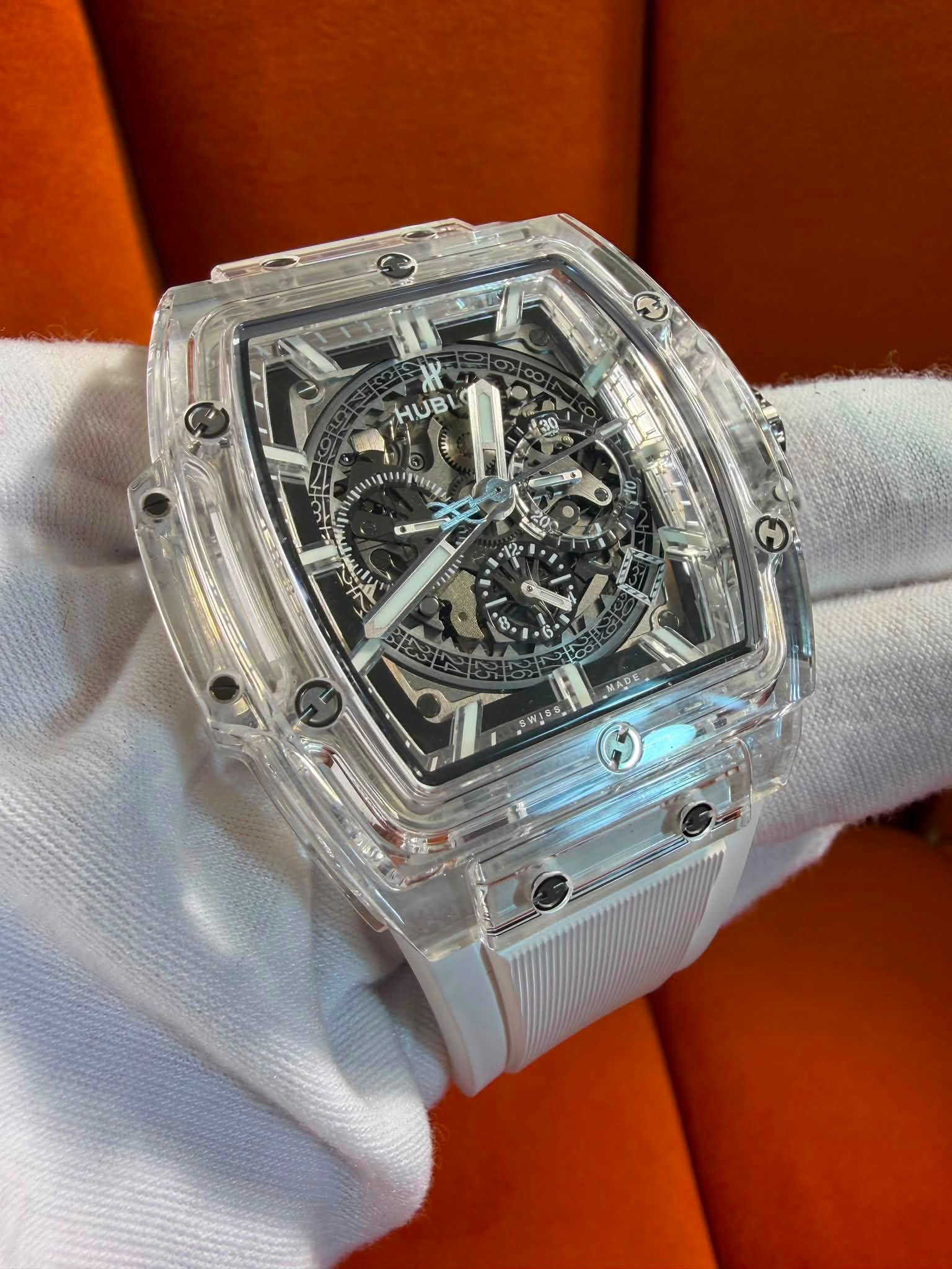 May be an image of wrist watch and text