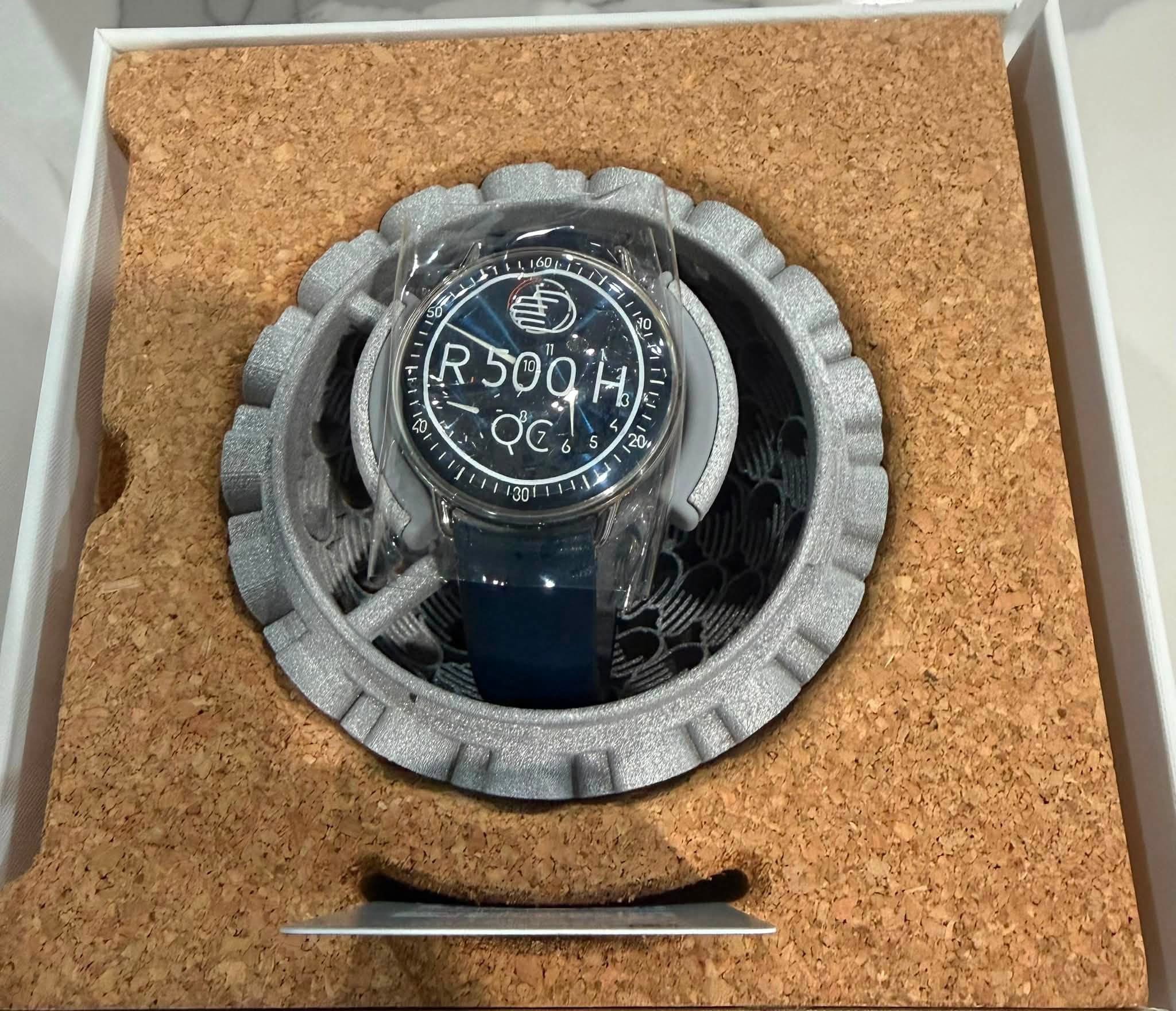 May be an image of digital watch and text