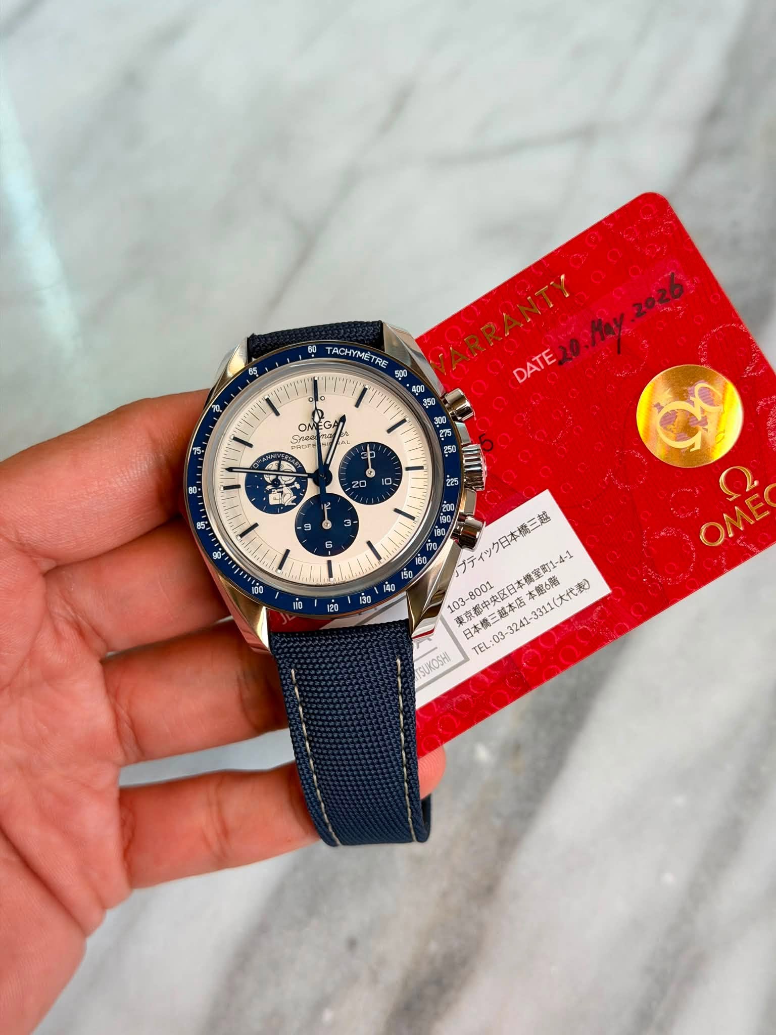 May be an image of wrist watch and text that says '今 2026 60 TACHΥΜET ET RE 400 ARRANTY DATE20.May 600 30 焼 ONEG WEGA EGA и Siee ROFE ㅎ P o 고기 2o 0 0 in 430 B VIII 般 ティック日本橋三越…