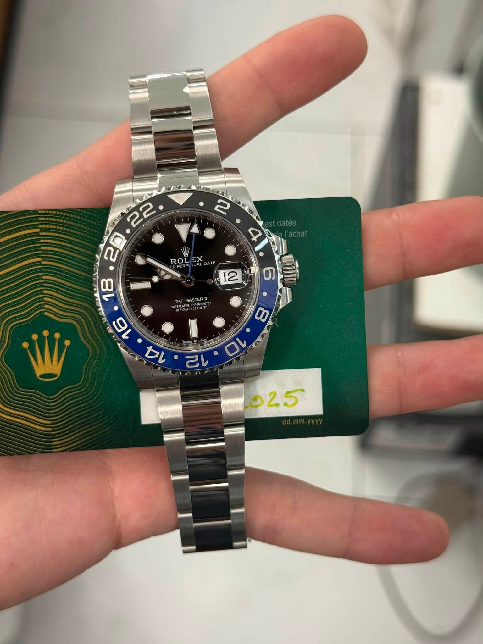 May be an image of wrist watch and text that says ' ROL ወ '