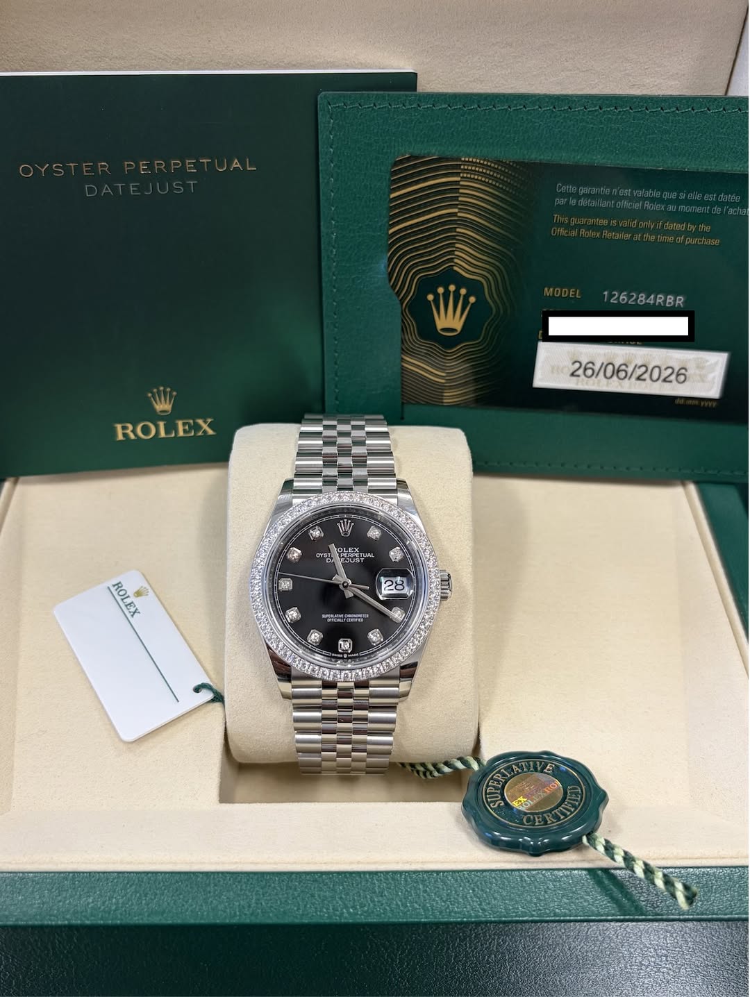 May be an image of wrist watch and text that says '126284RBR ROLEX 26/06/2026 A T0L 野ー W6T ROLEX MEX ROL 8 PY 牛 전수 O 7 28 28 知 ធ'