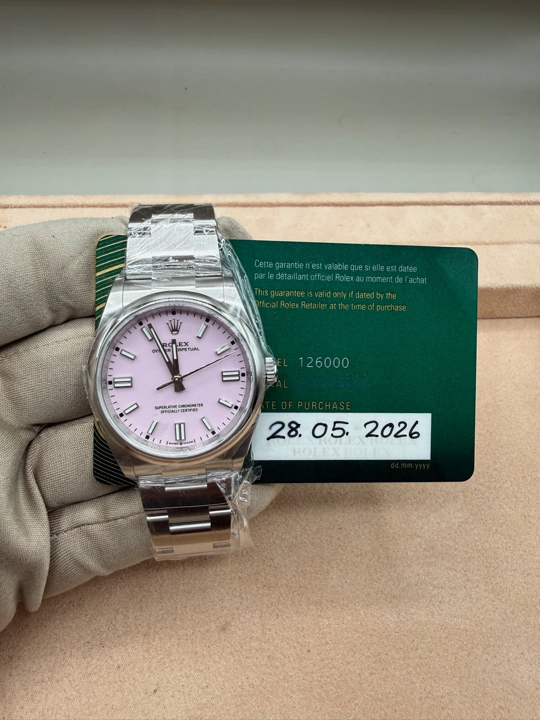 May be an image of wrist watch and text