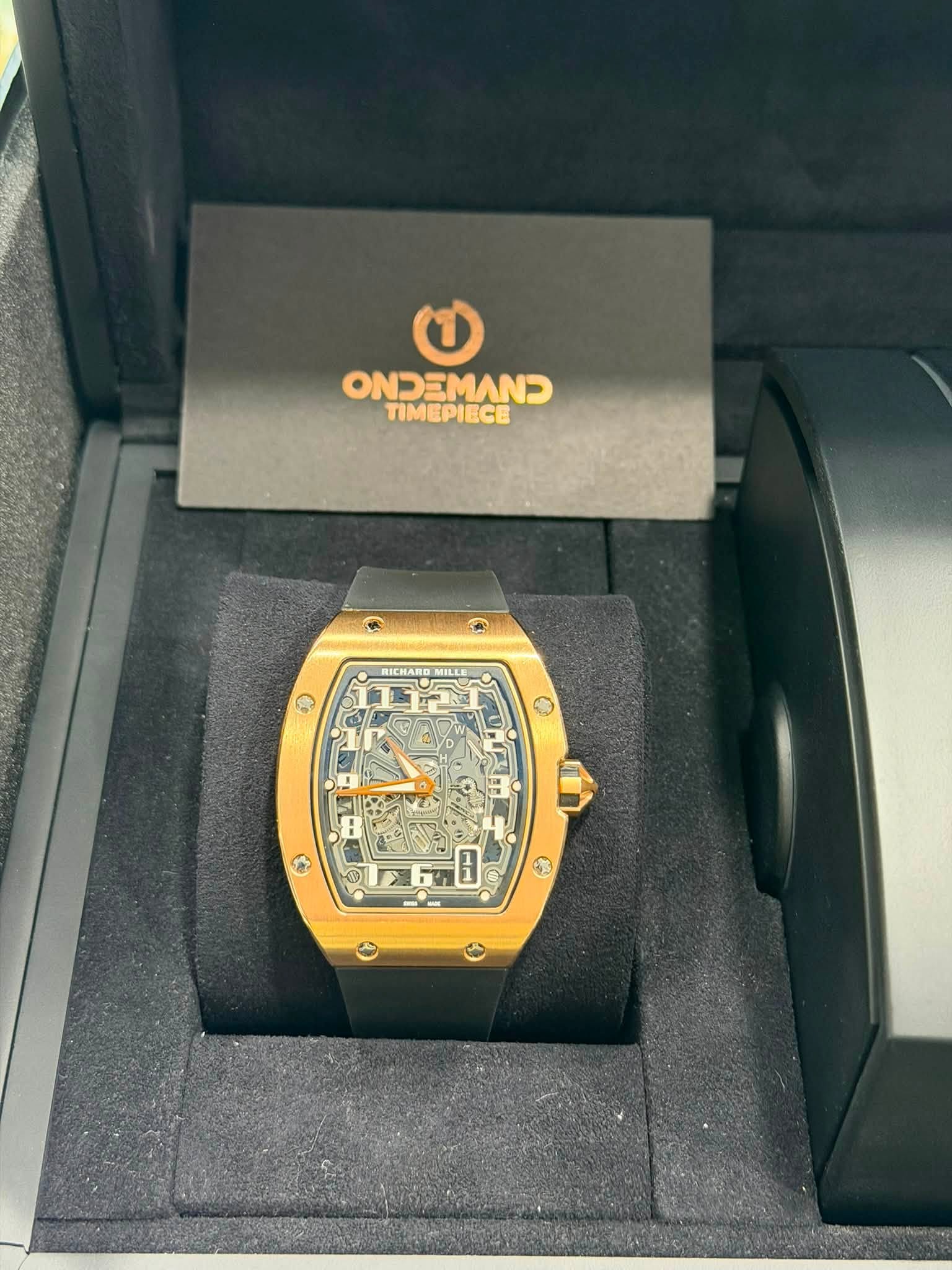 May be an image of wrist watch and text that says 'ΟΝ TIMEPIECE BICHAR RICHARD MILLE ف'