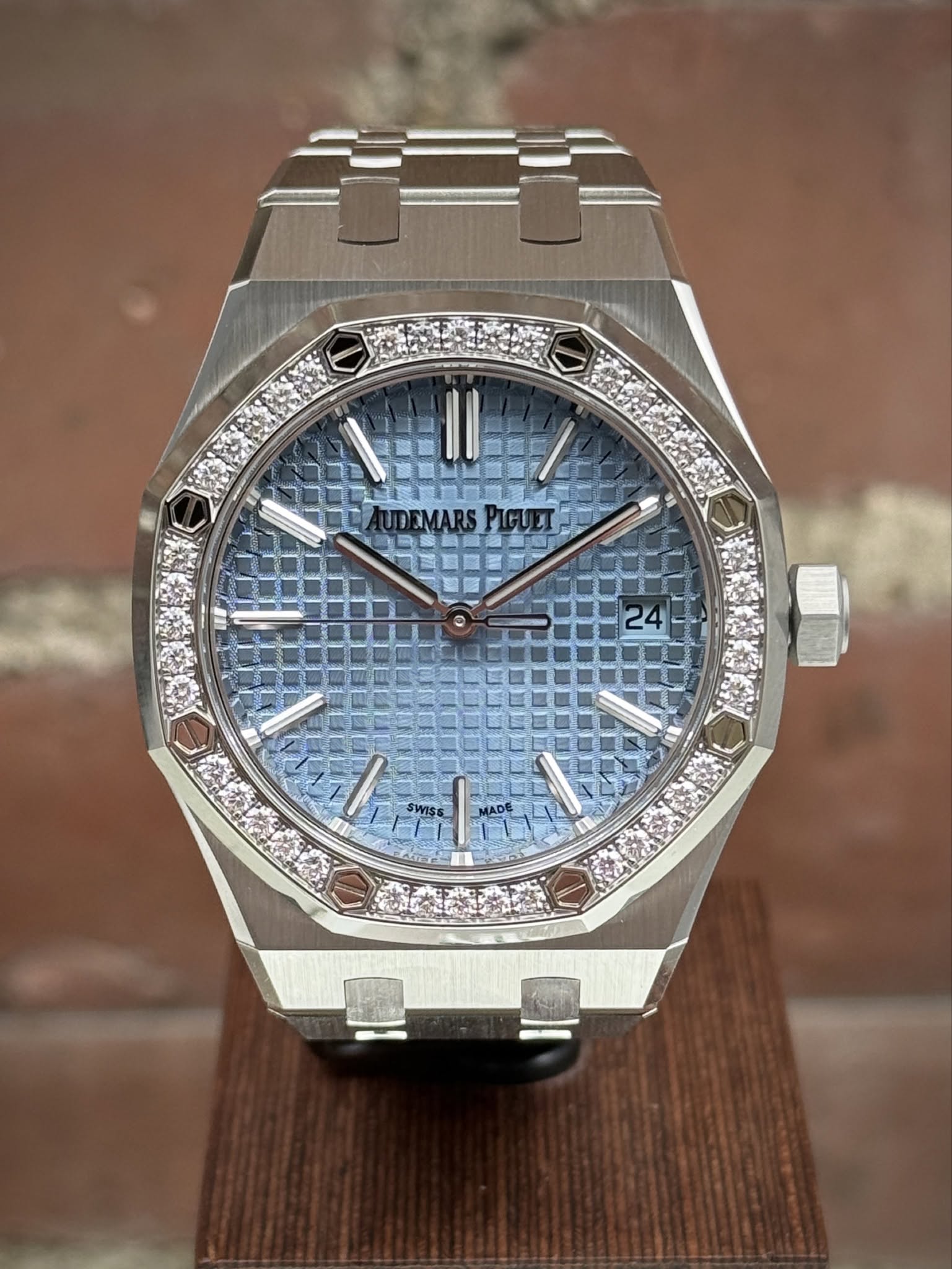 May be an image of wrist watch and text