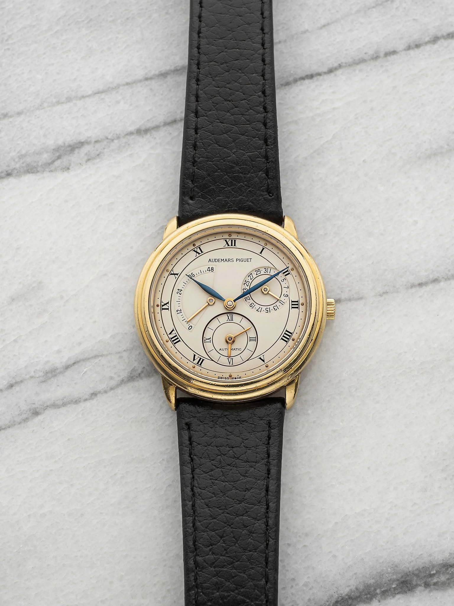 May be an image of leather and wrist watch
