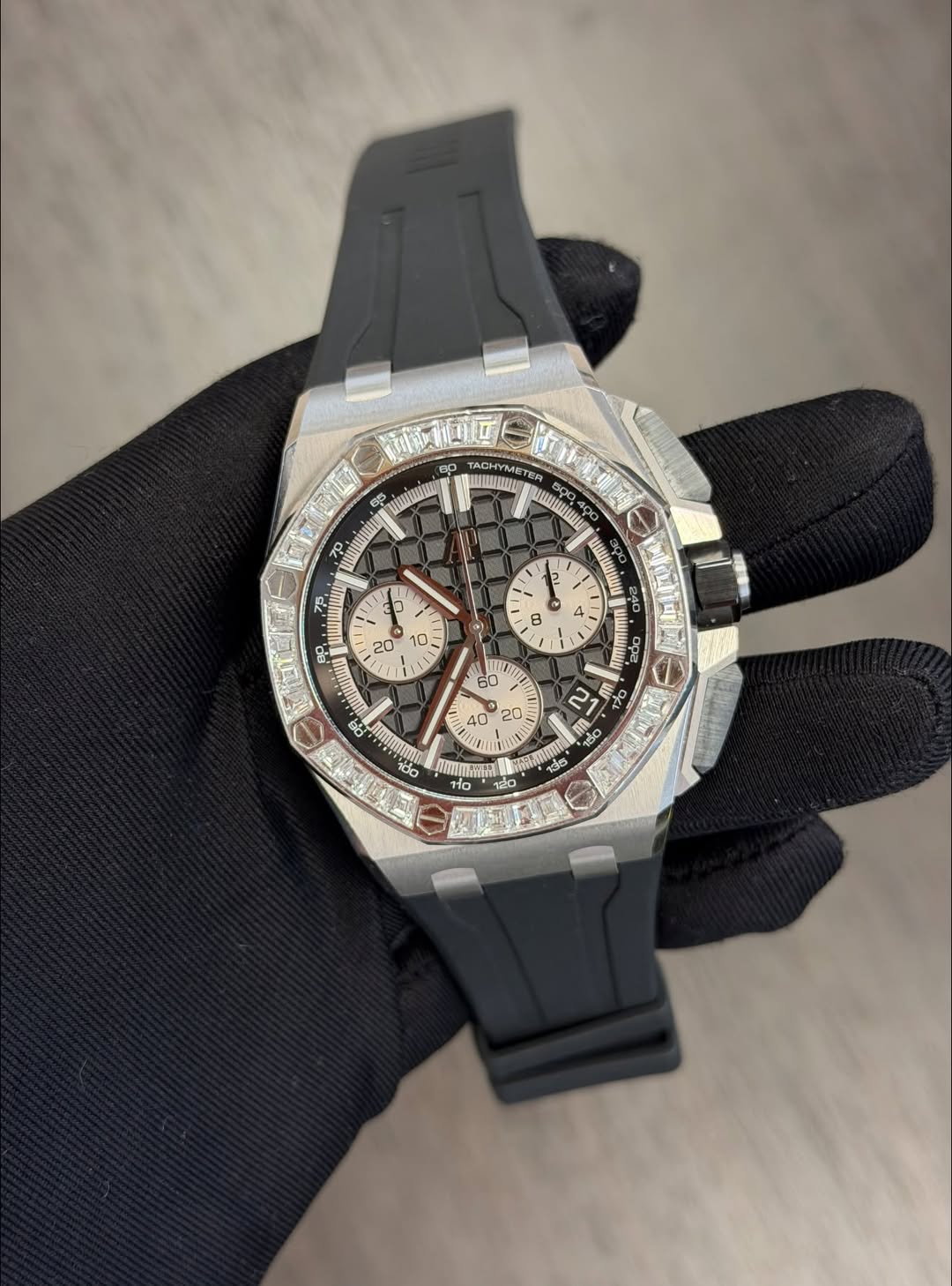 May be an image of wrist watch and text