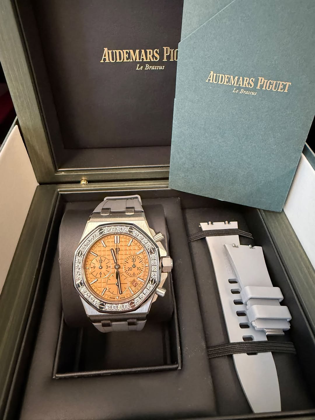 May be an image of wrist watch and text