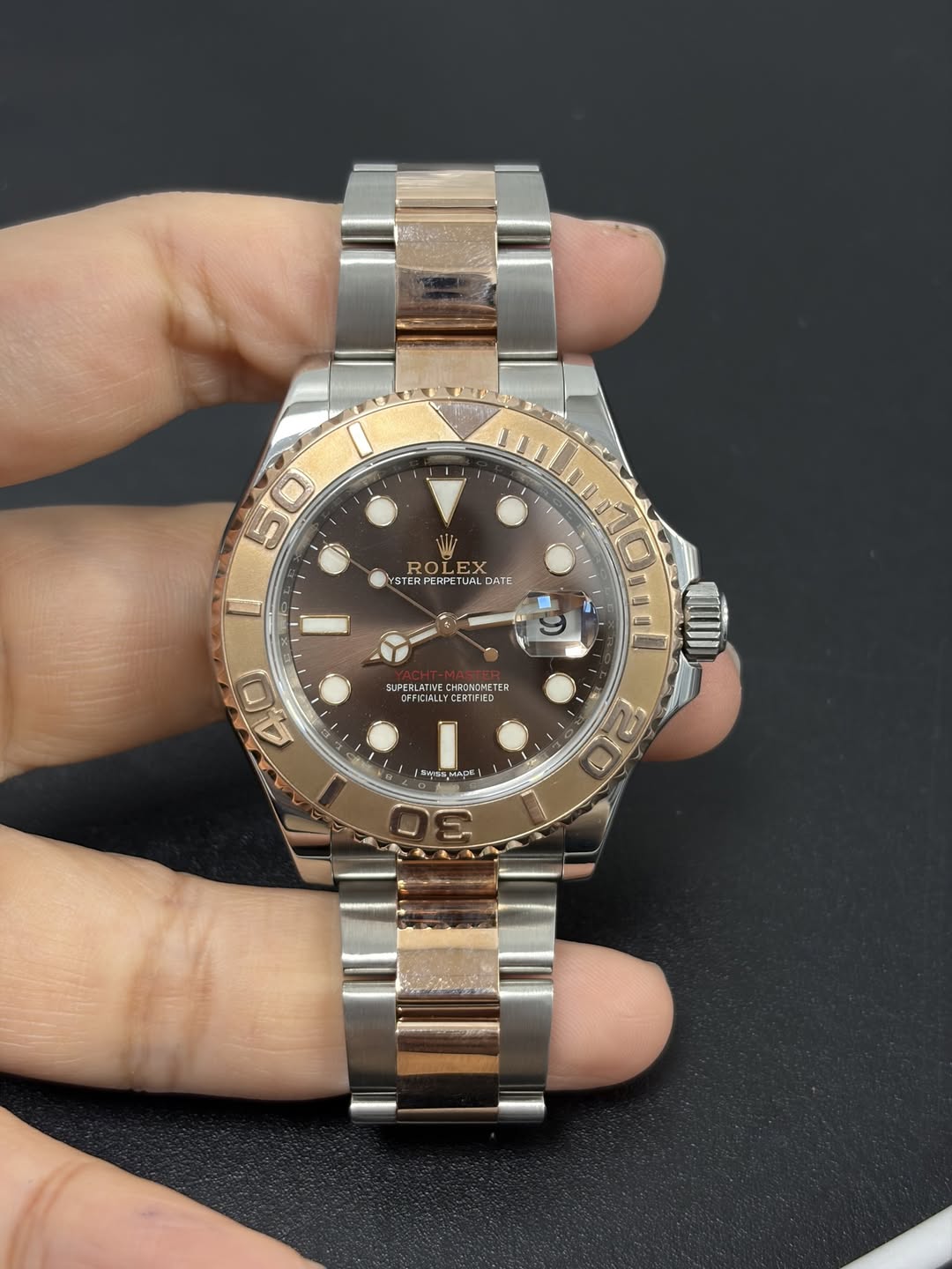 May be an image of wrist watch and text