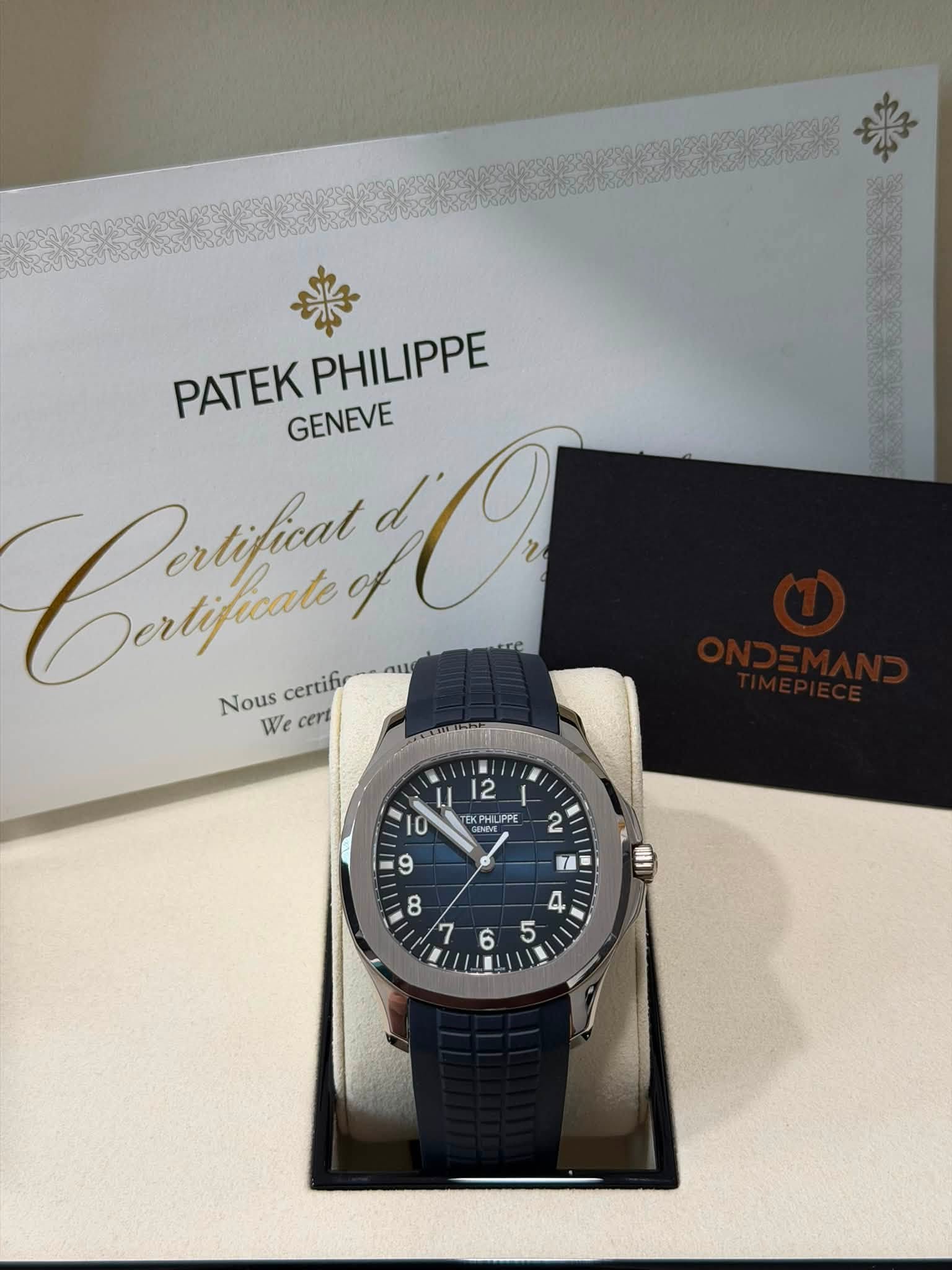 May be an image of wrist watch and text that says 'PATEKPHILIPPE PATEK GENEVE PHILIPPE Crtfin au1o 0 Nous We cert certifir LI 10 12 I tKP XPHILIPPE LPPE '