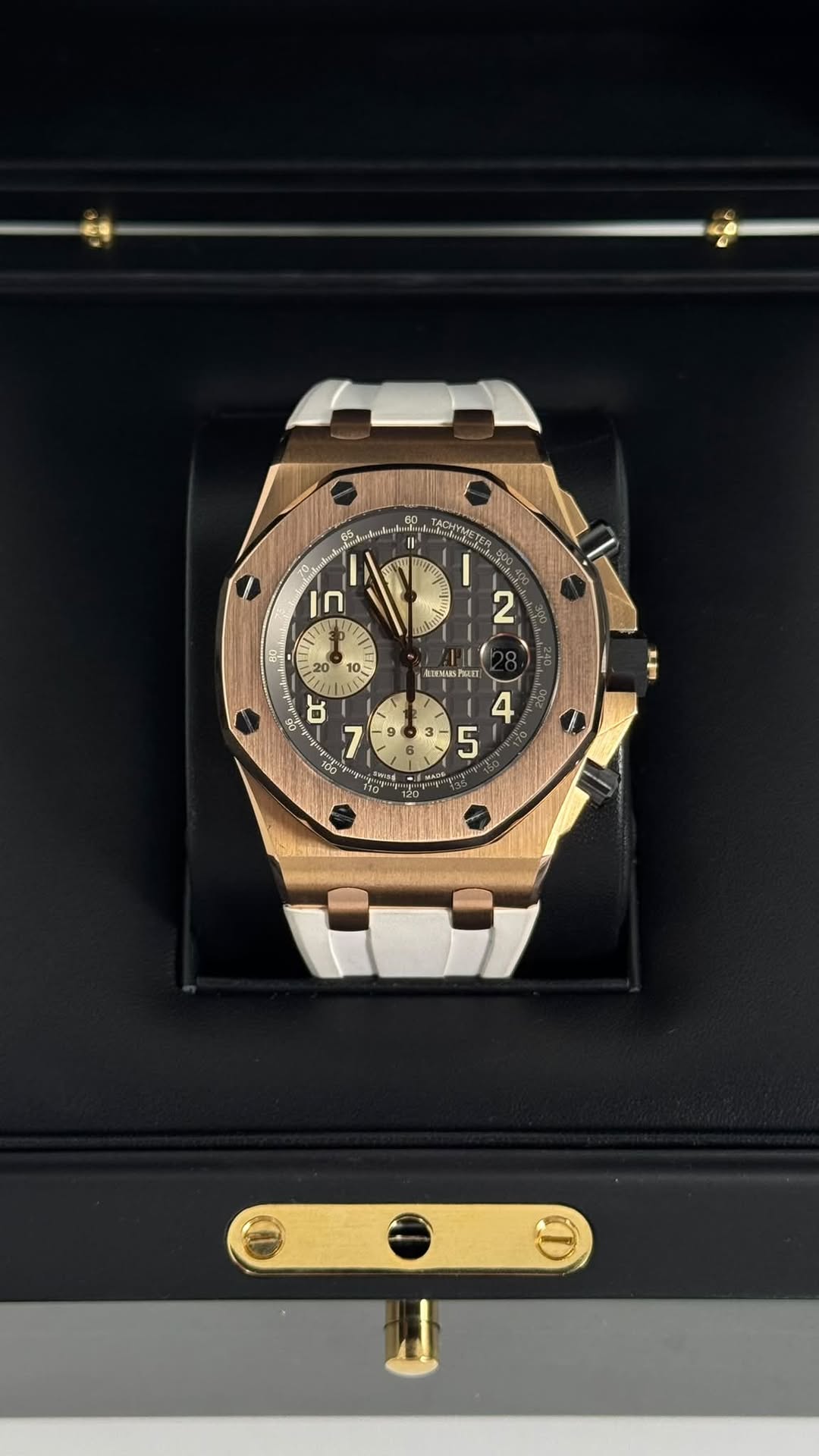 May be an image of wrist watch and text