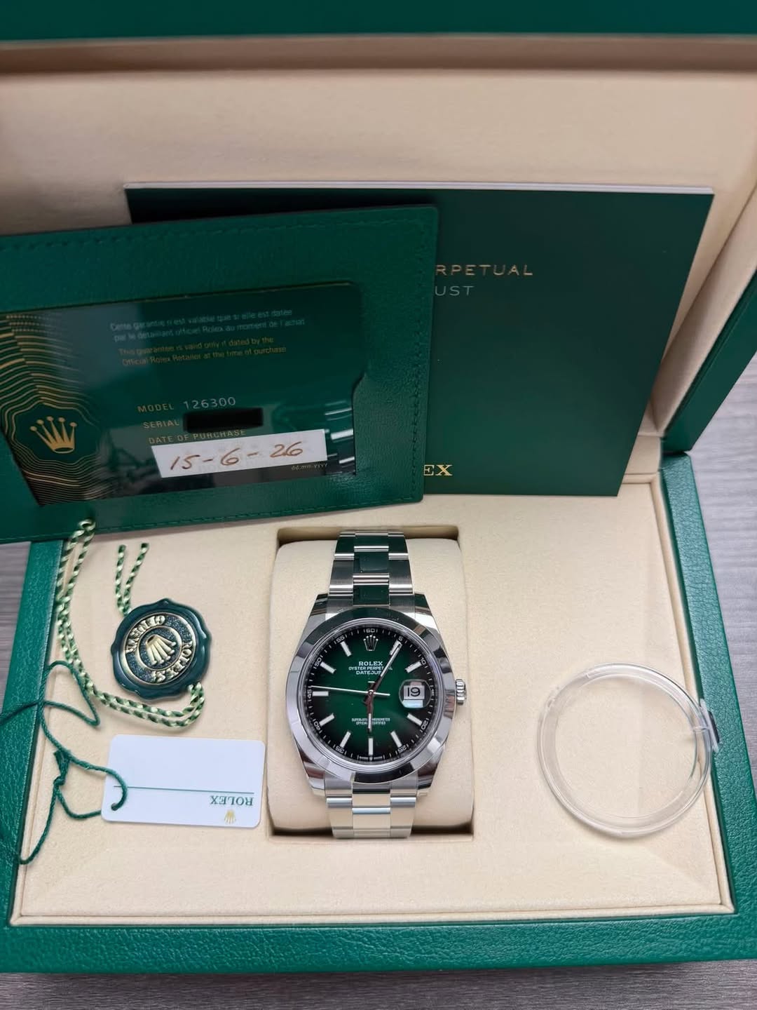 May be an image of wrist watch and text
