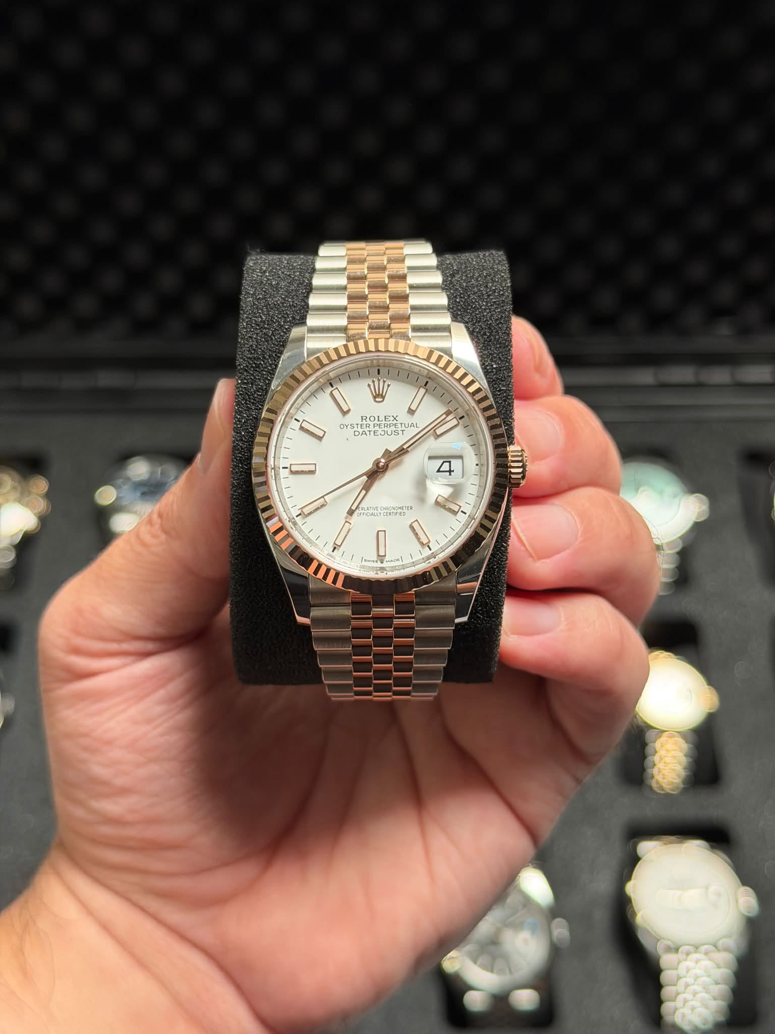 May be an image of wrist watch and text